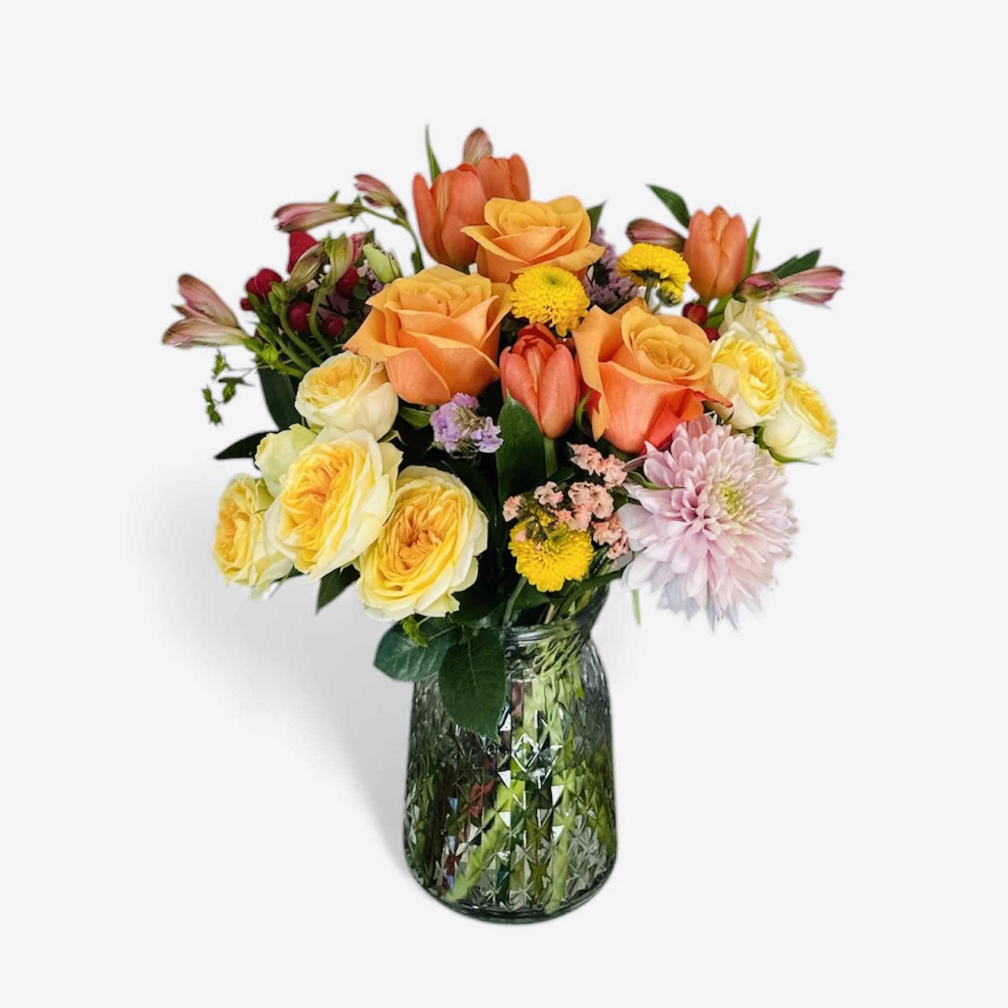 Brighten someone&rsquo;s day with Joyful, a cheerful floral arrangement featuring vibrant orange