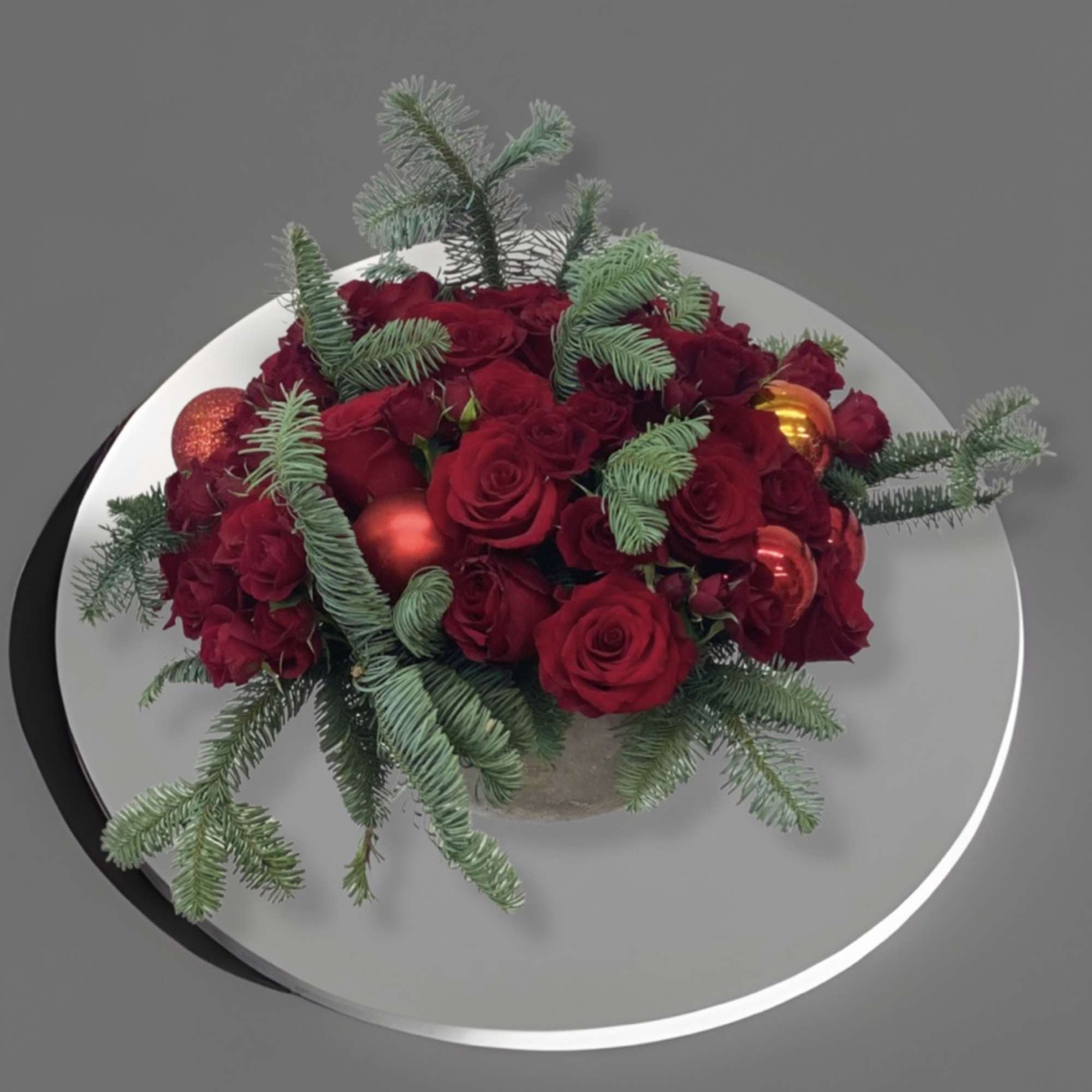 This elegant arrangement will set a holiday tone for any home or