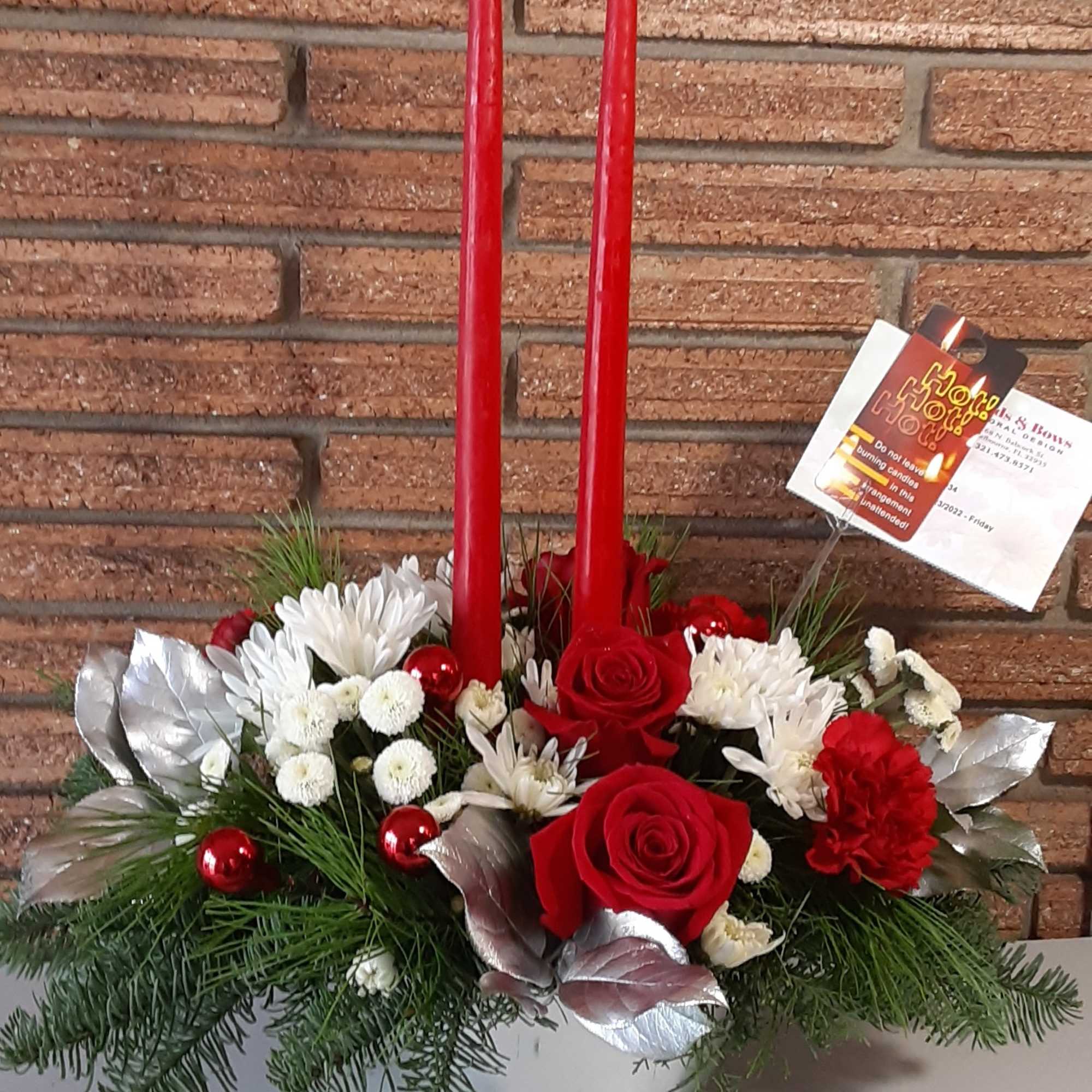 Make the season bright with glowing tapered candles engulfed in radiant holiday