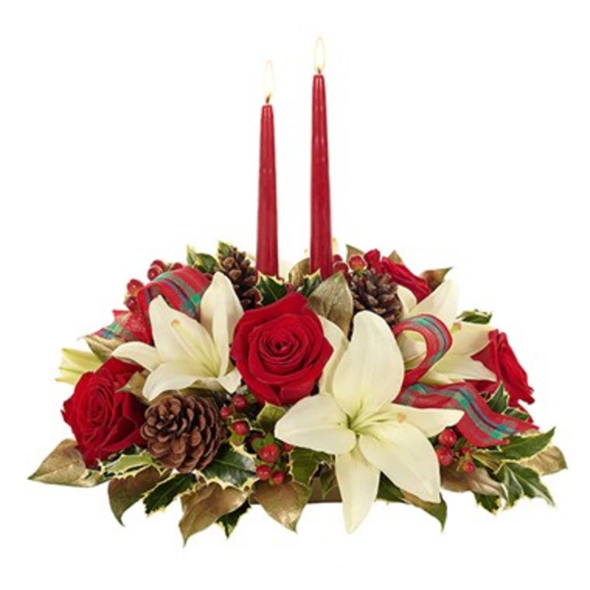 Asiatic lilies, roses, hypericum and carnations are blended creatively in an oval