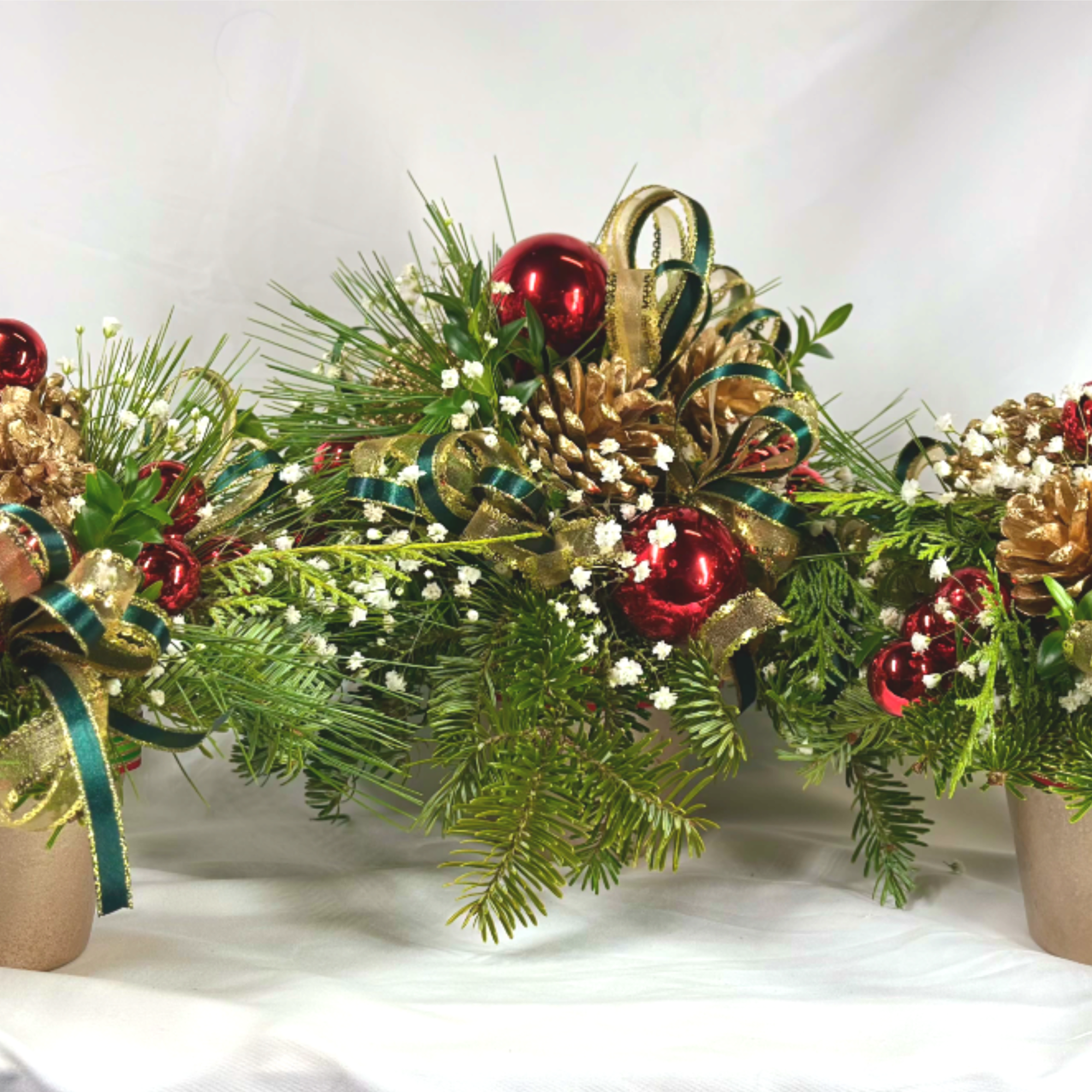 This delightful design is actually three festive holiday arrangements in one! 