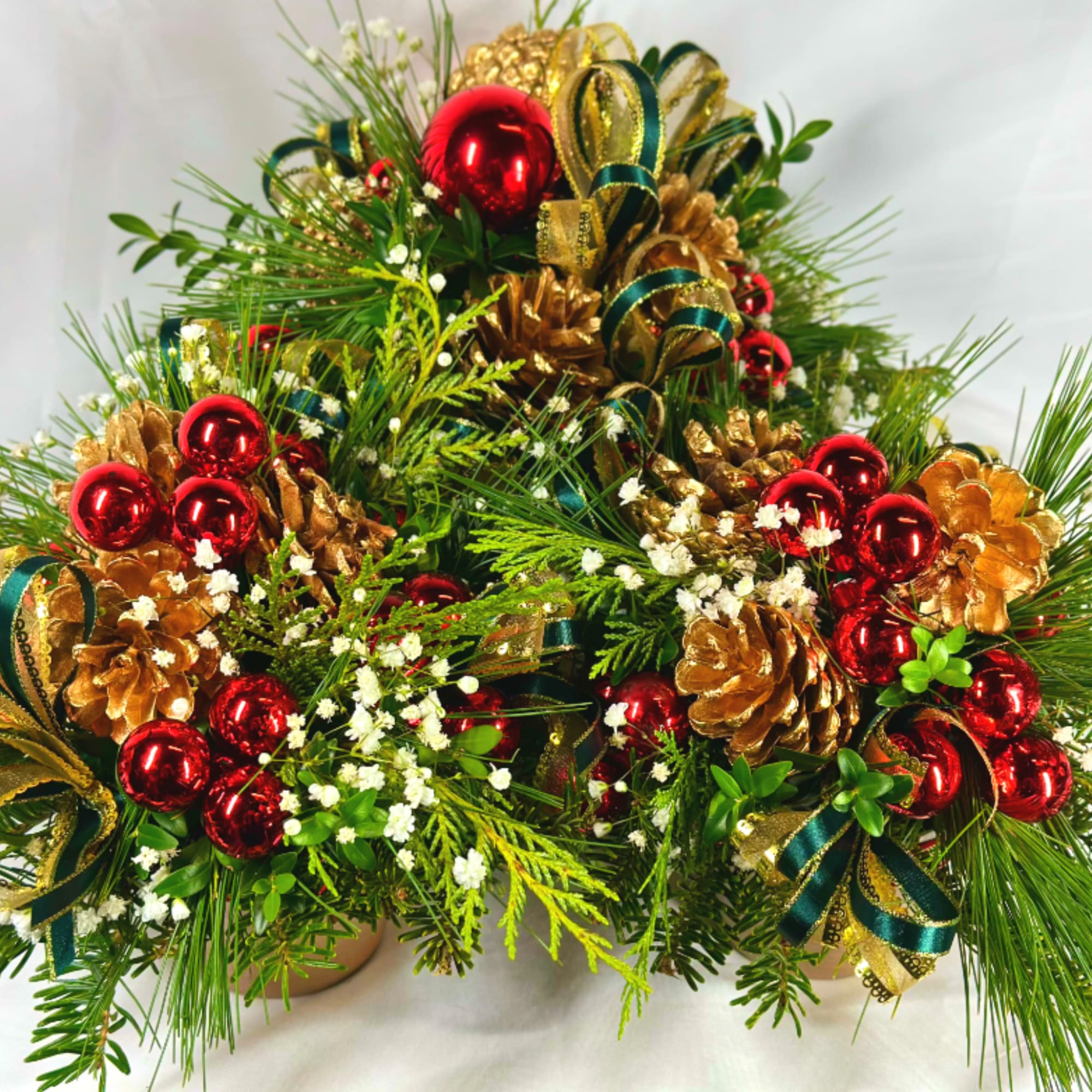 This delightful design is actually three festive holiday arrangements in one! 