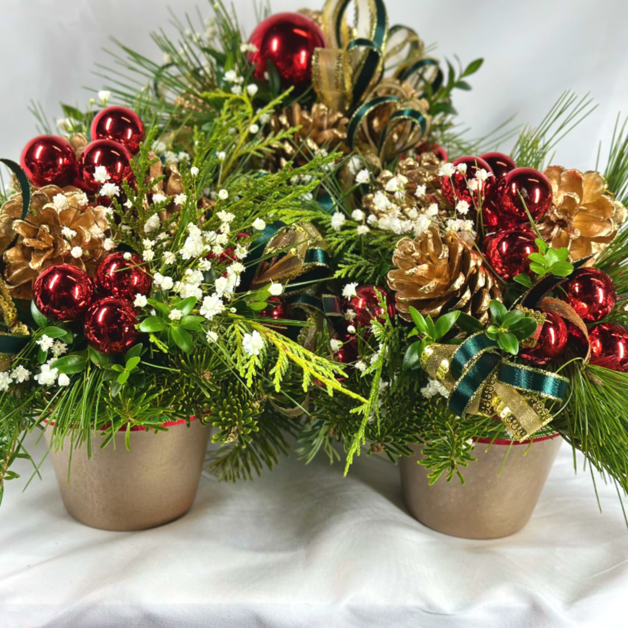 This delightful design is actually three festive holiday arrangements in one! 