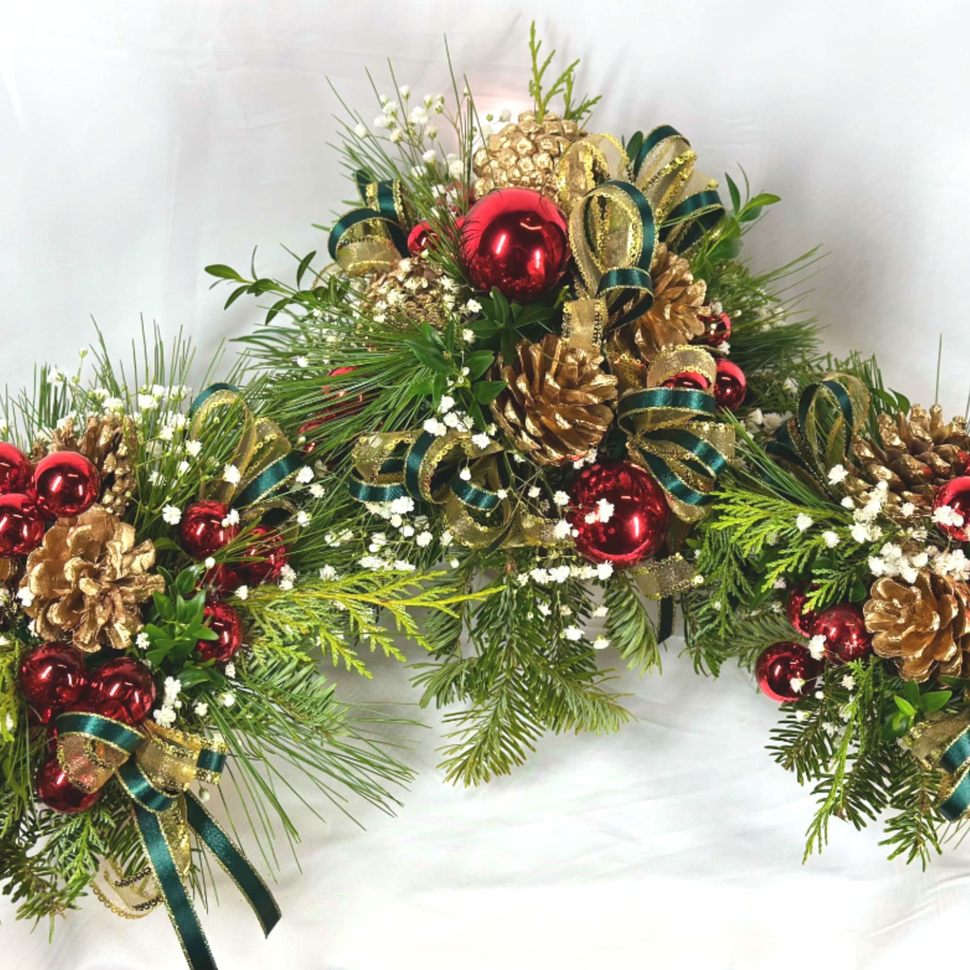 This delightful design is actually three festive holiday arrangements in one! 