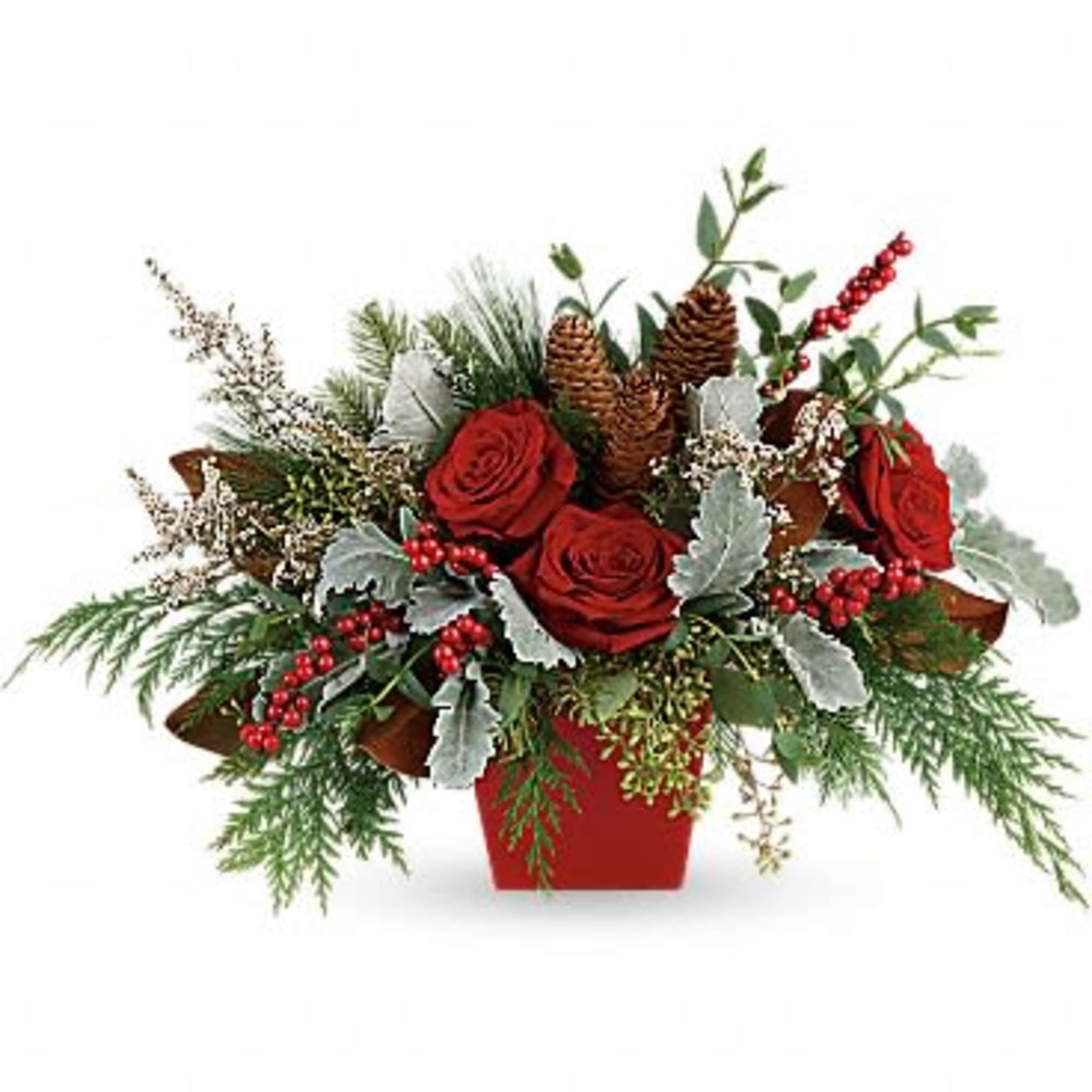 Not your everyday Christmas centerpiece, this artisanal mix of roses and berries