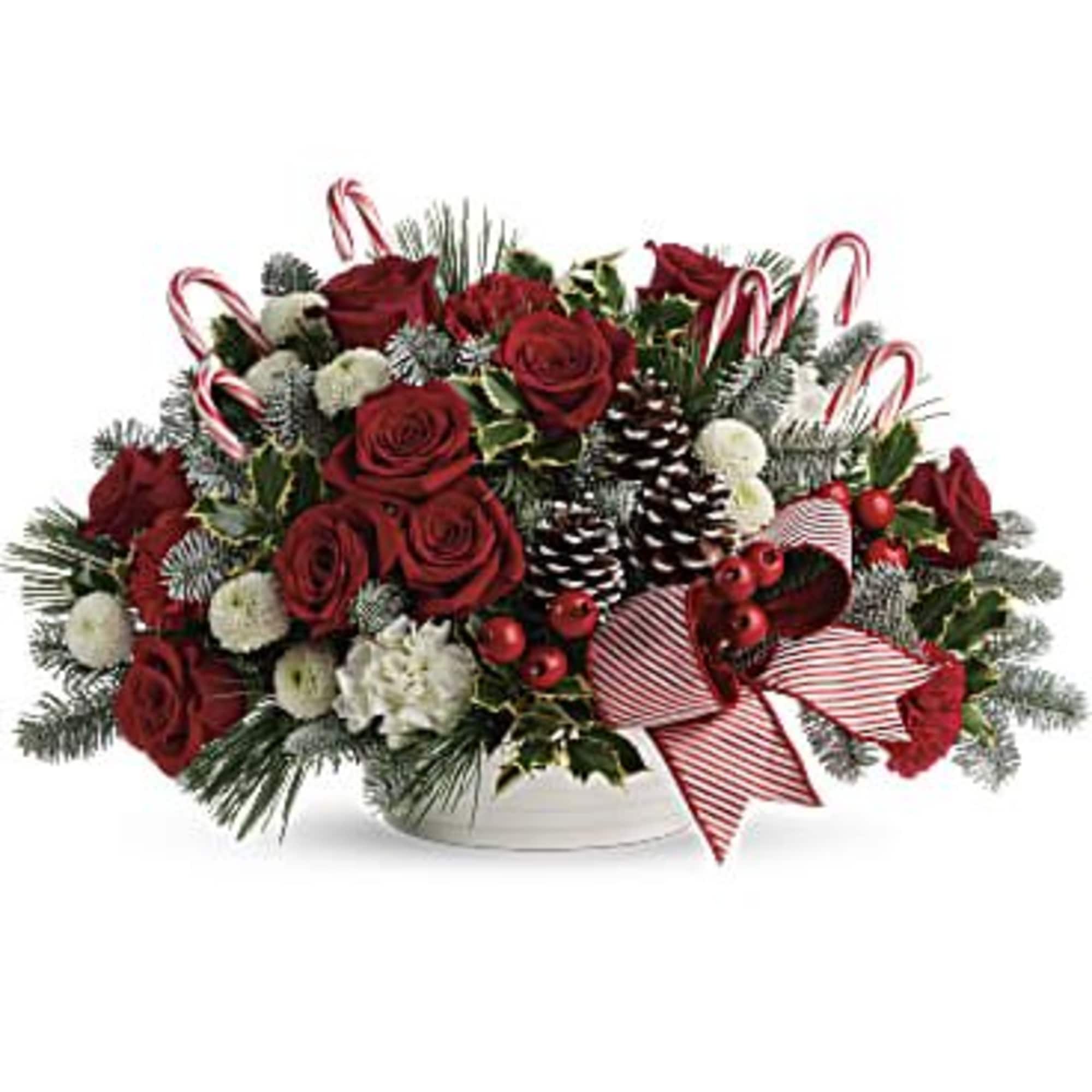 Spread jolly cheer with this magnificent bouquet of Christmas roses and winter