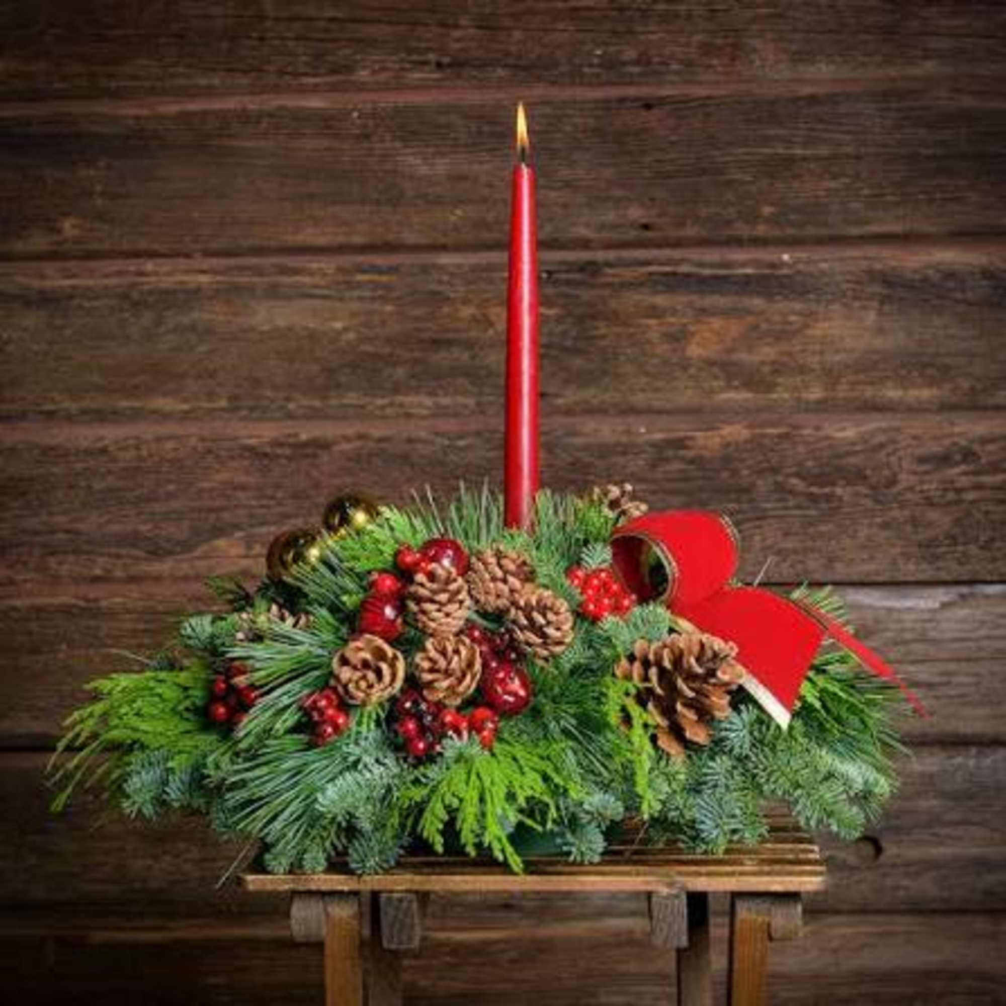 Handmade beautifully designed holiday centerpiece with candles 