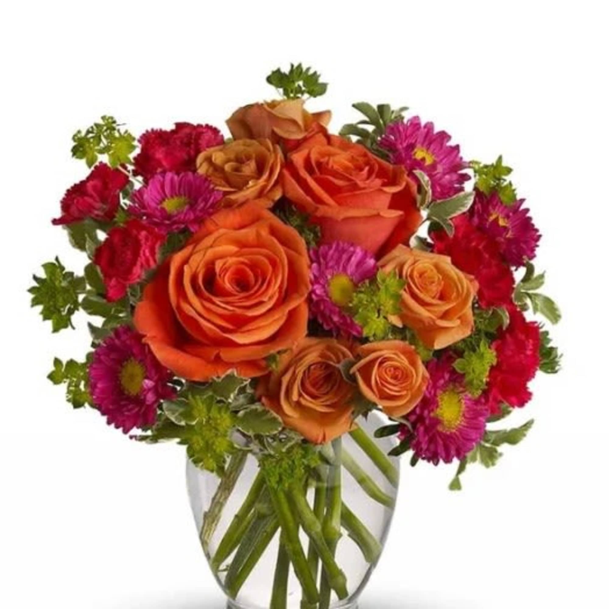 Arrangement includes orange roses, assorted red,purple/orange flowers and greenery in a glass