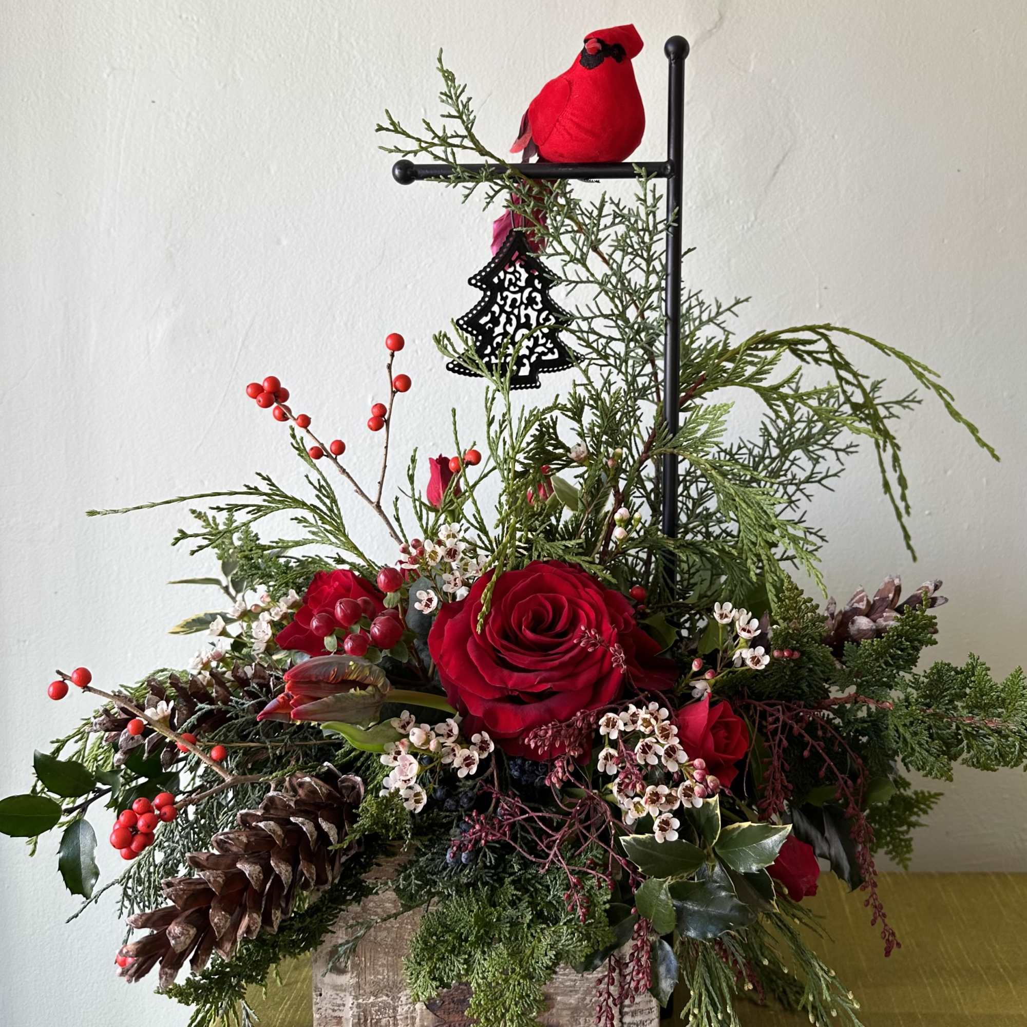 This fun arrangement is sure to bring holiday cheer to any table!