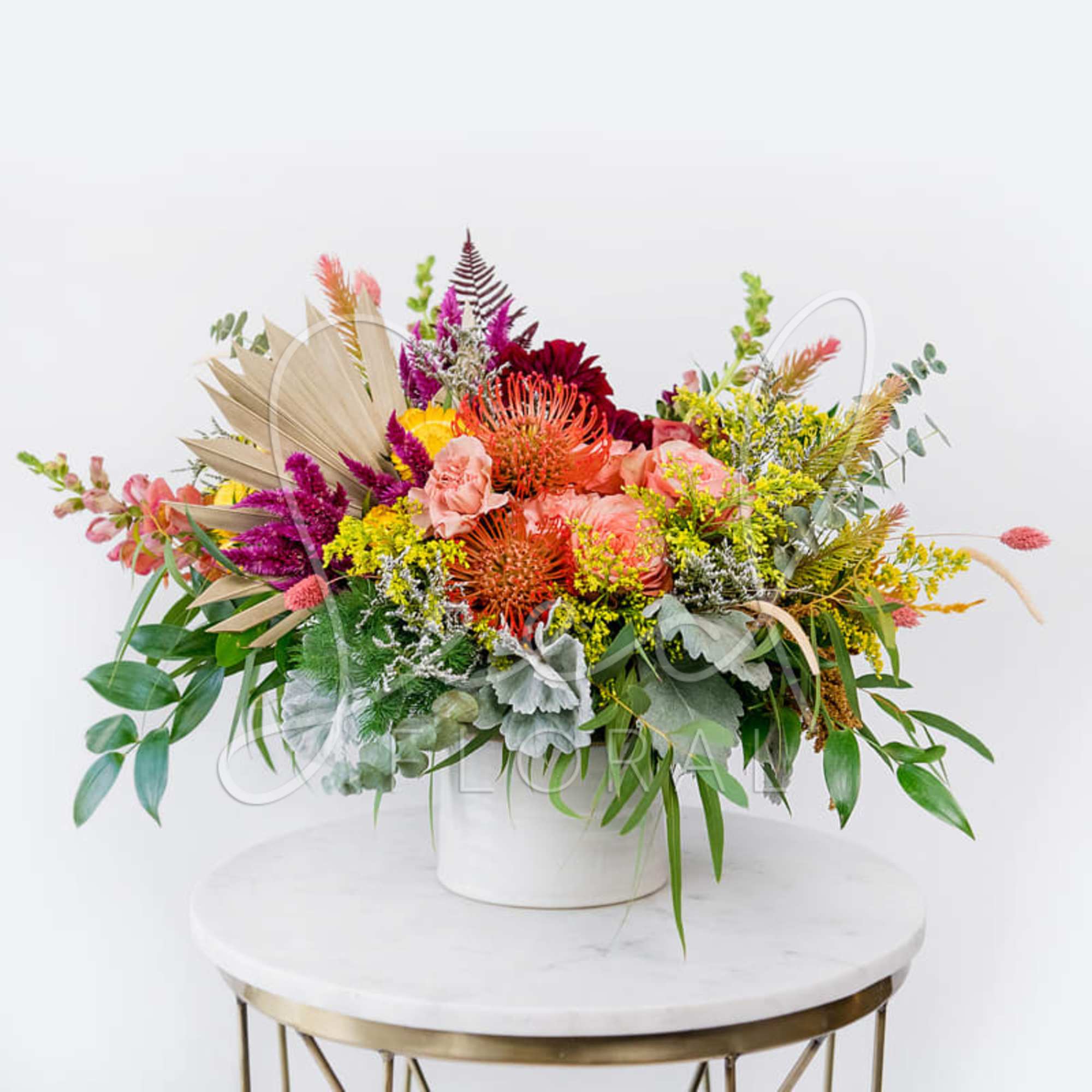 Discover the beauty of the season with Our Seasonal Medium Arrangement, expertly