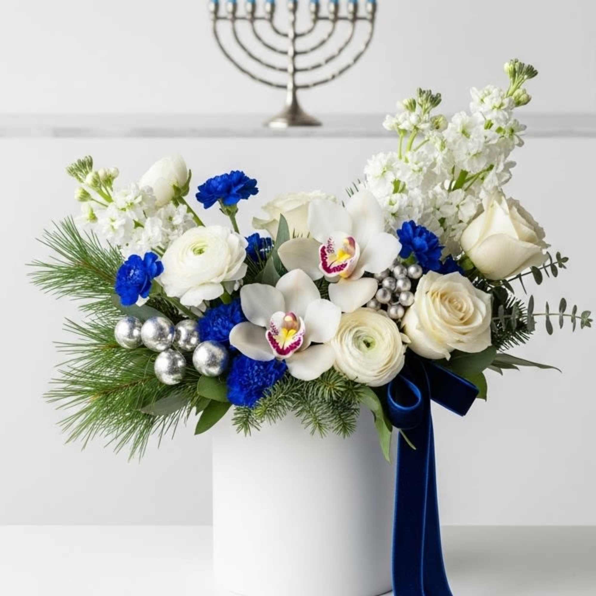 Modern clean design of crisp white premium floral, blue and silver accents