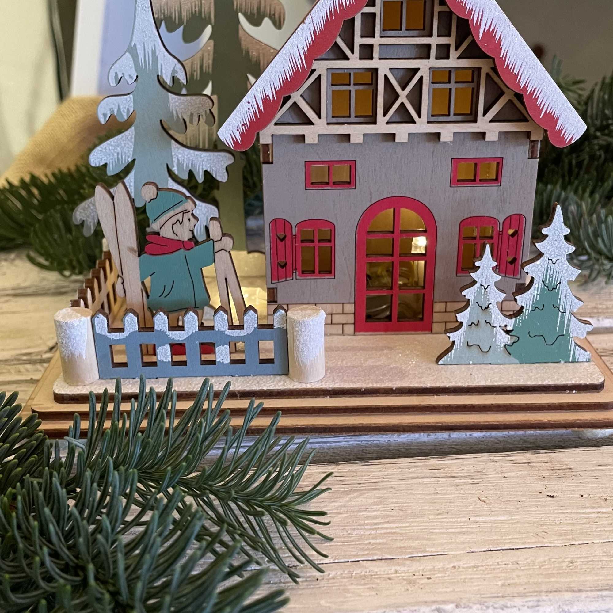 Battery operated mini wooden ski chalet 
