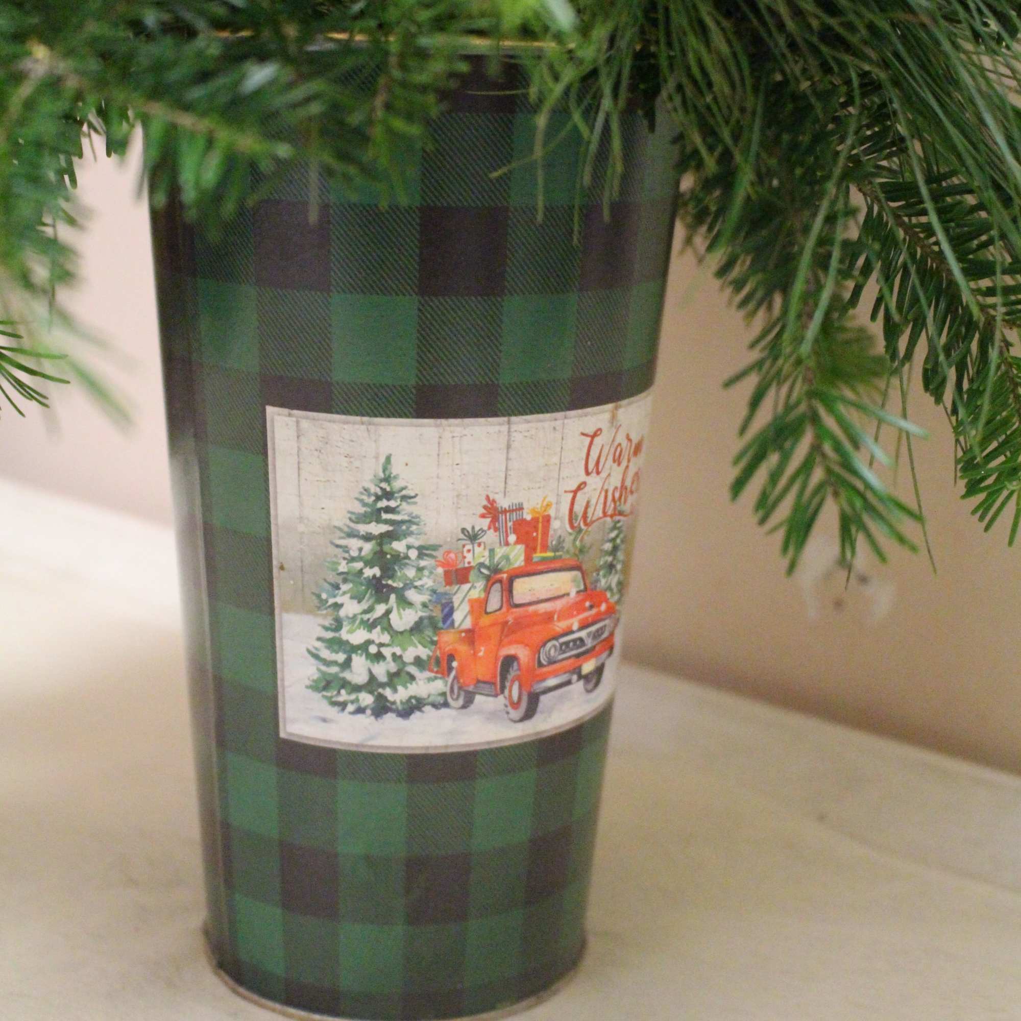  Seasonal arrangement in a vintage container featuring an old-fashioned truck filled