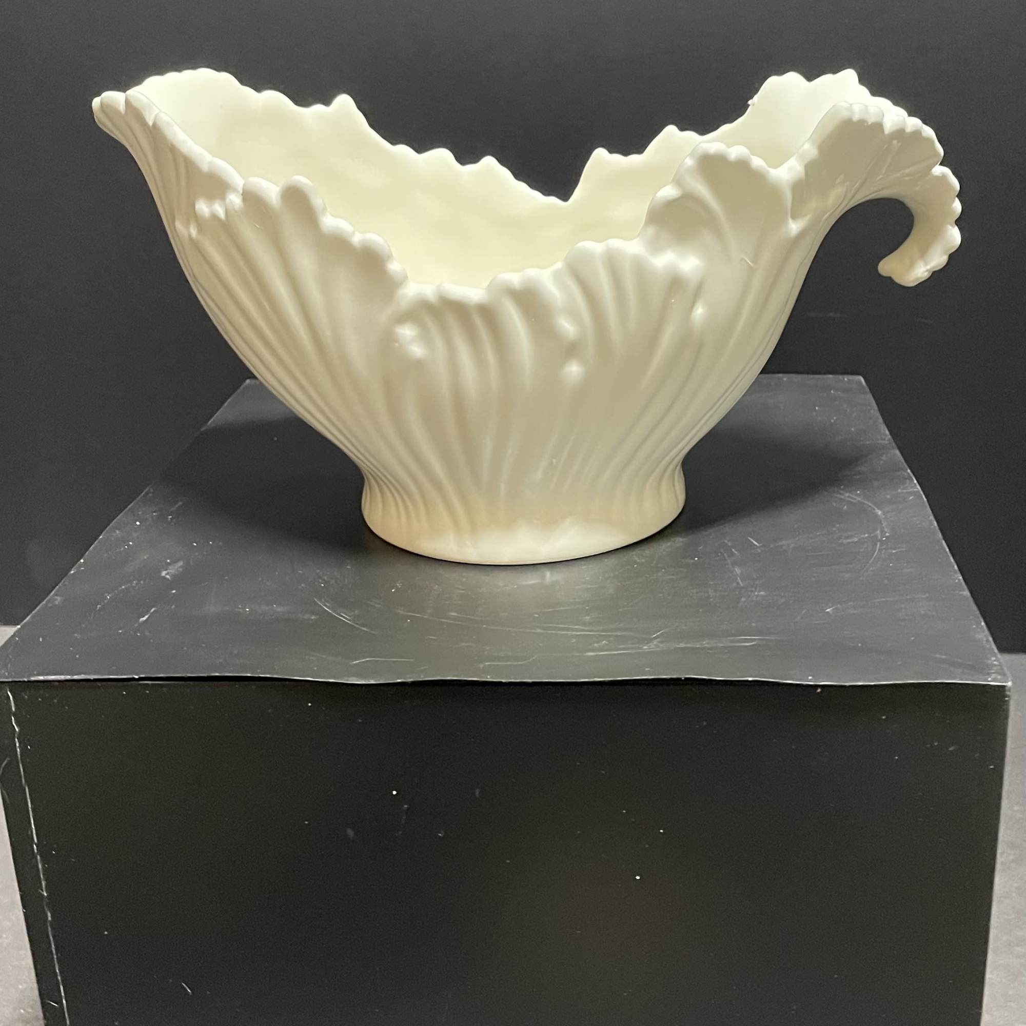 Beautiful blend of holiday trim with a lasting white Lenox serving bowl.