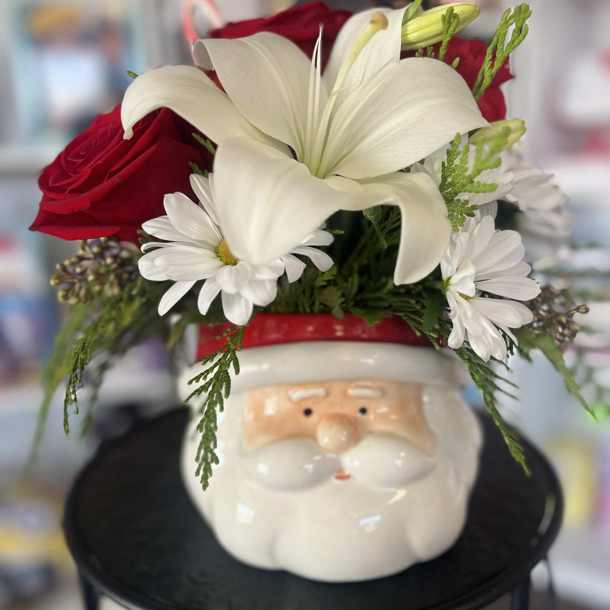 fresh flowers in Santa vase 