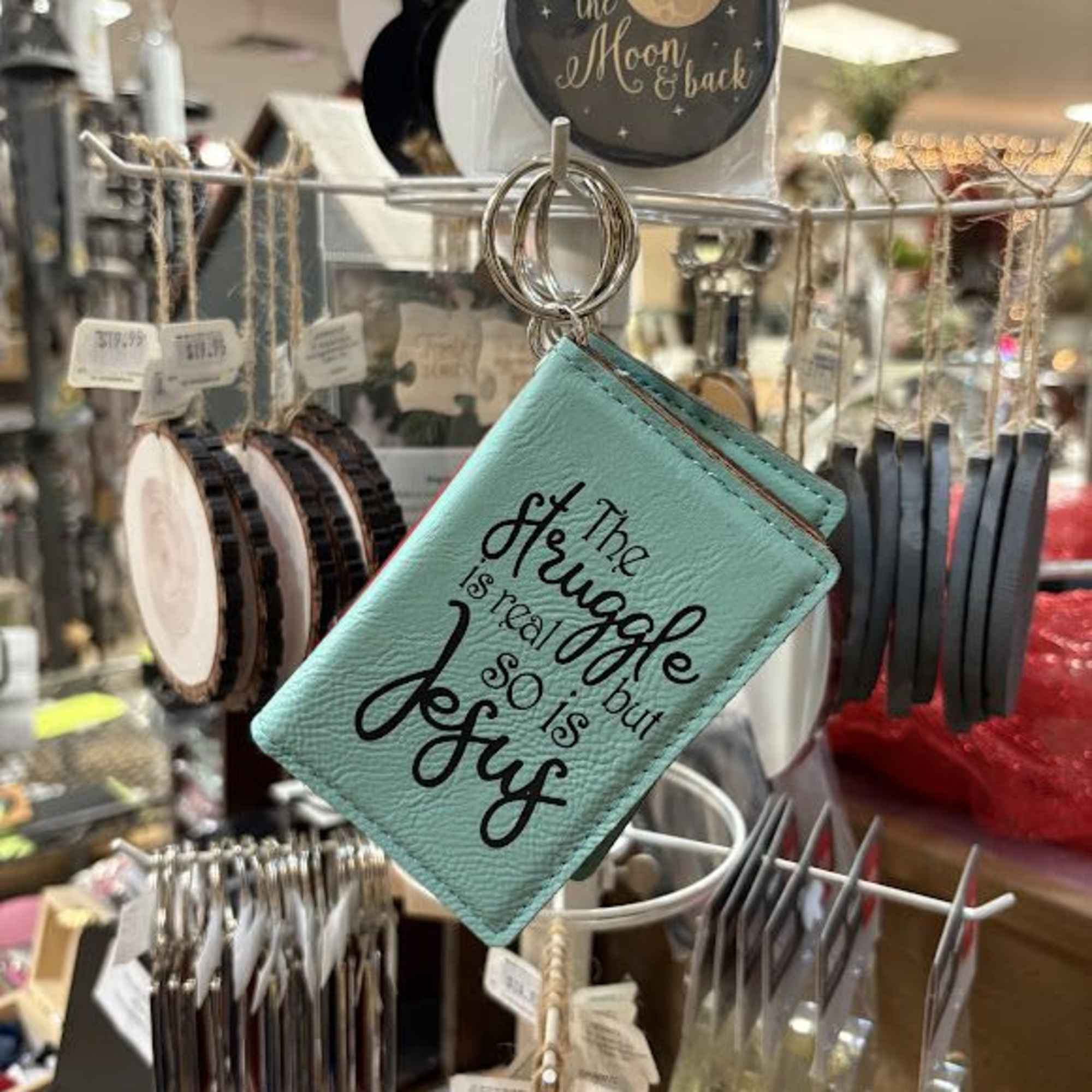 One pocket on outside of holder, measures 4" x 2 1/4".
ID Holder