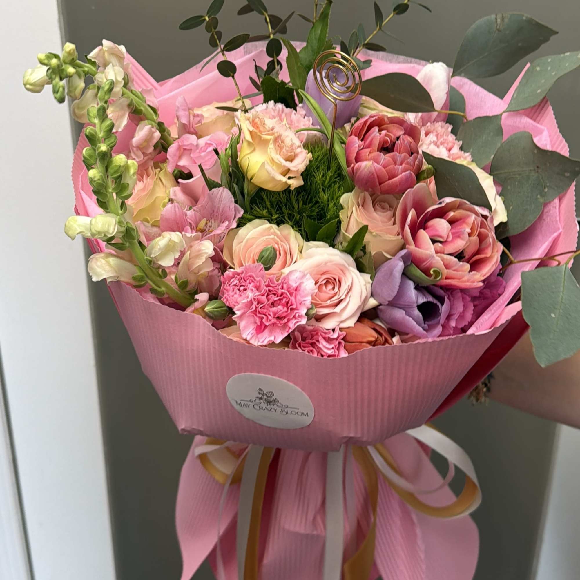 This enchanting hand-tied bouquet is a celebration of softness, romance, and natural