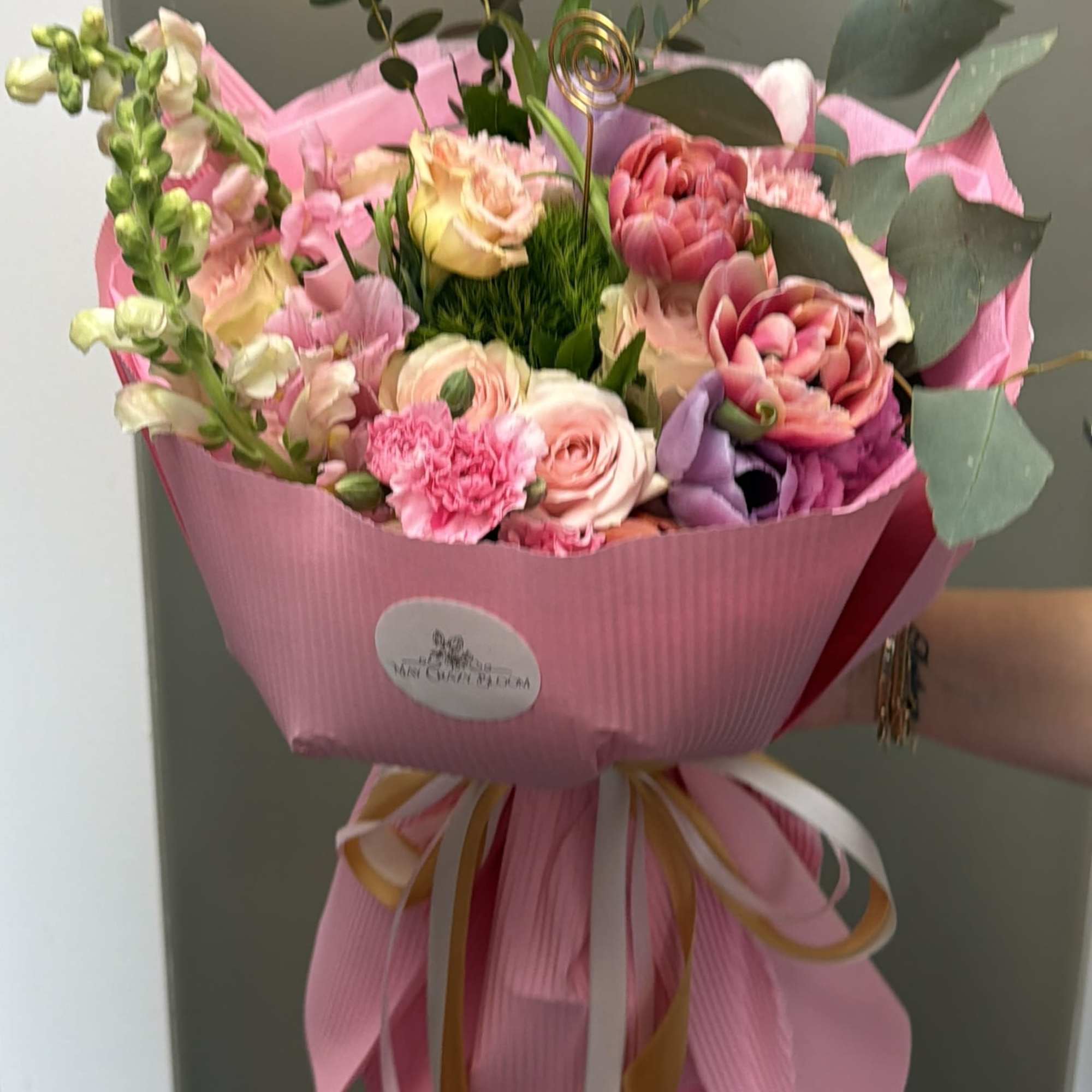 This enchanting hand-tied bouquet is a celebration of softness, romance, and natural