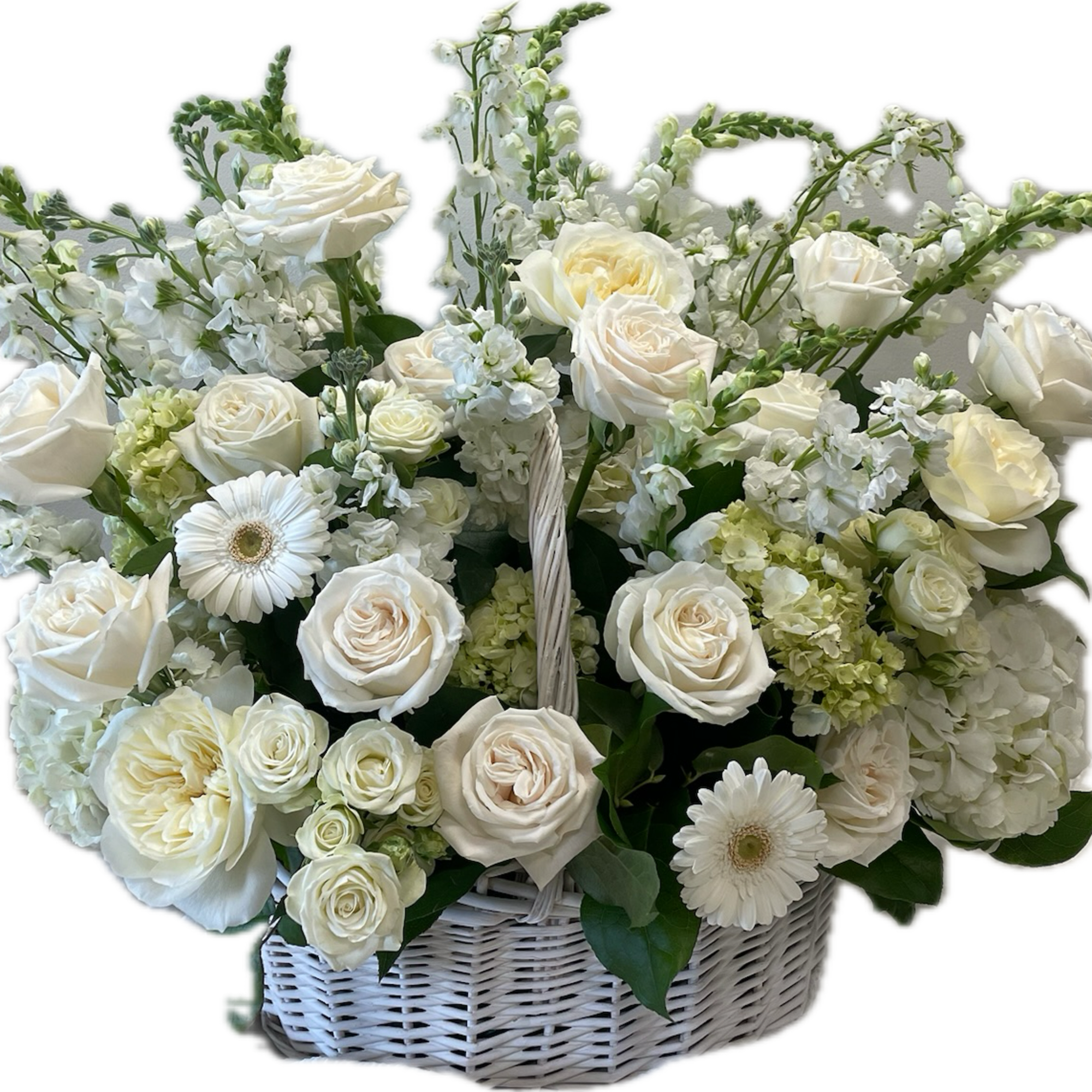 Pure Remembrance is a timeless and elegant floral tribute of all-white blooms