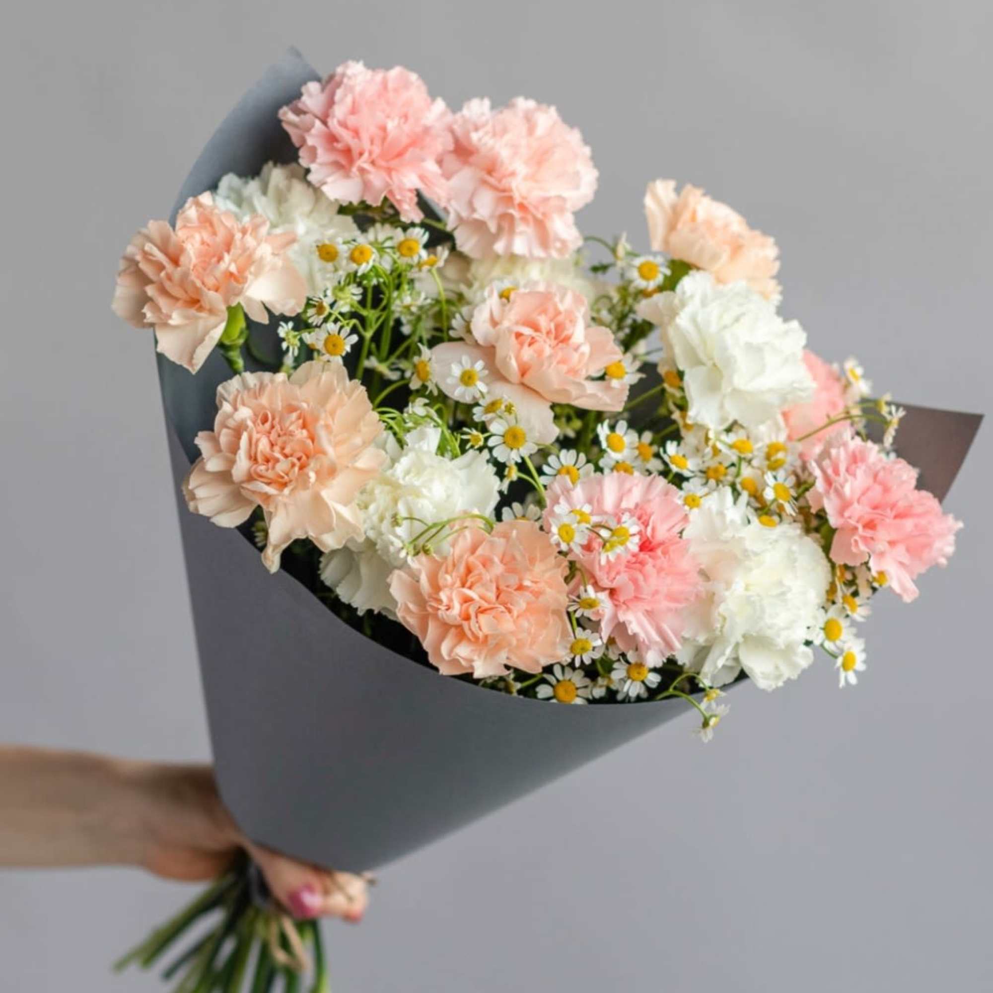 Bouquet of Carnation with mini Daisies.
