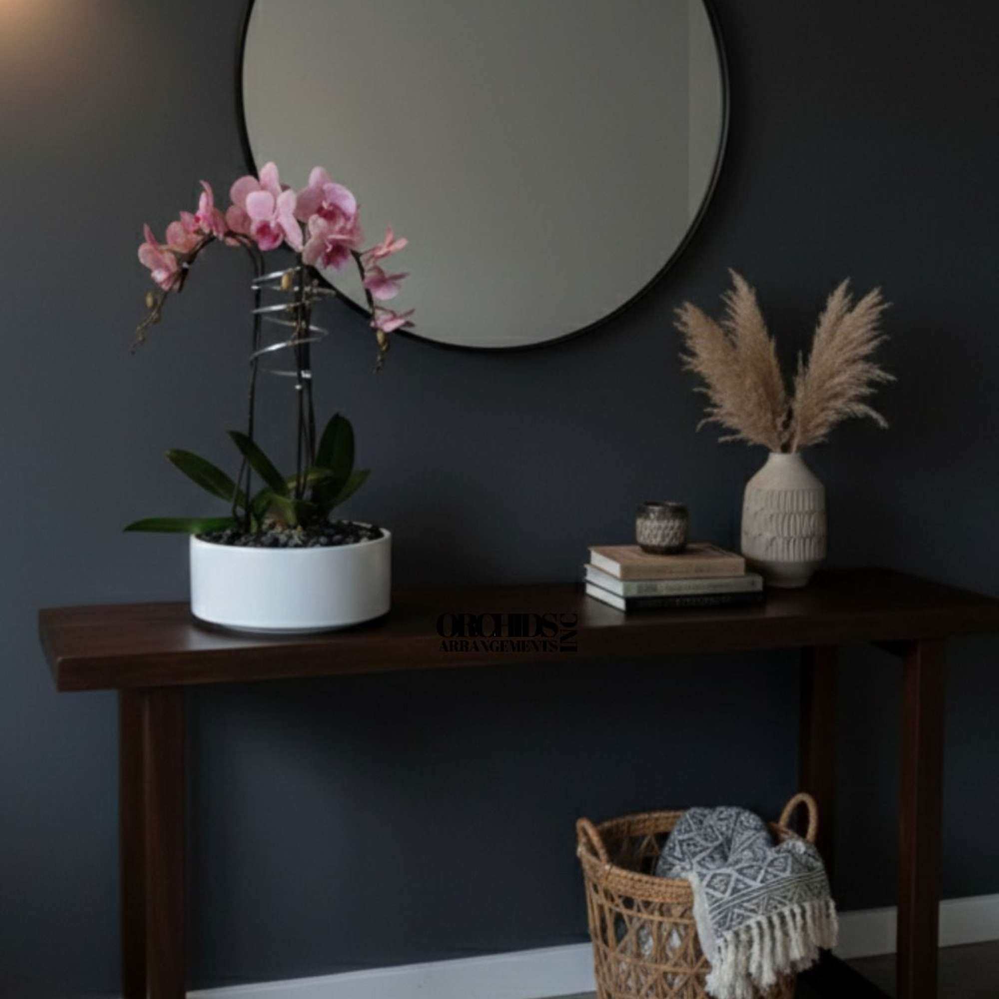 A high quality Triple pink orchid arrangement with a vase 9" D