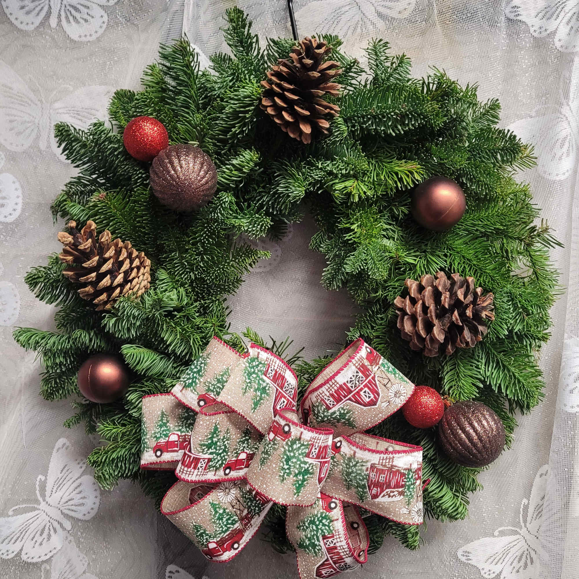 Christmas wreaths, a timeless tradition that starts off the holiday season. Little