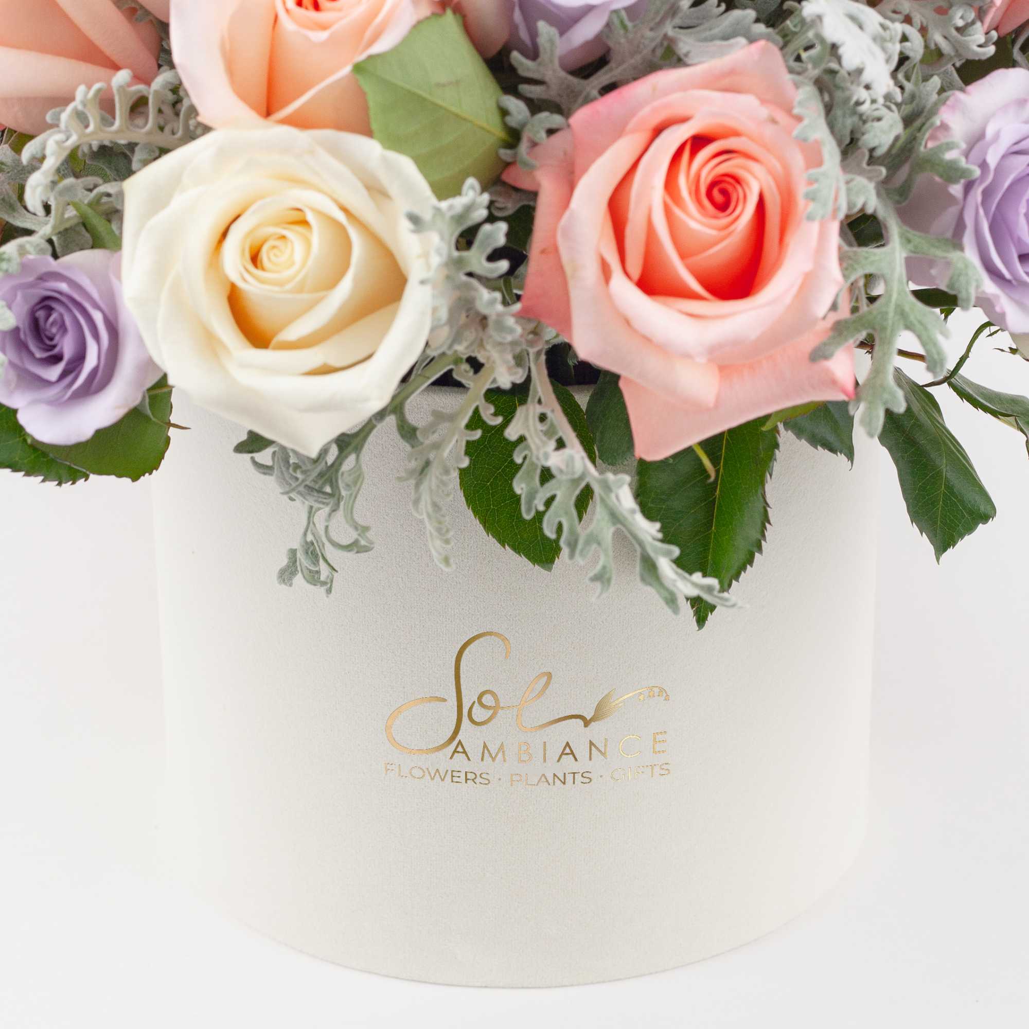  PASTEL ROSES IN LOGO BOX

Pretty and feminine. A sublime rose arrangement