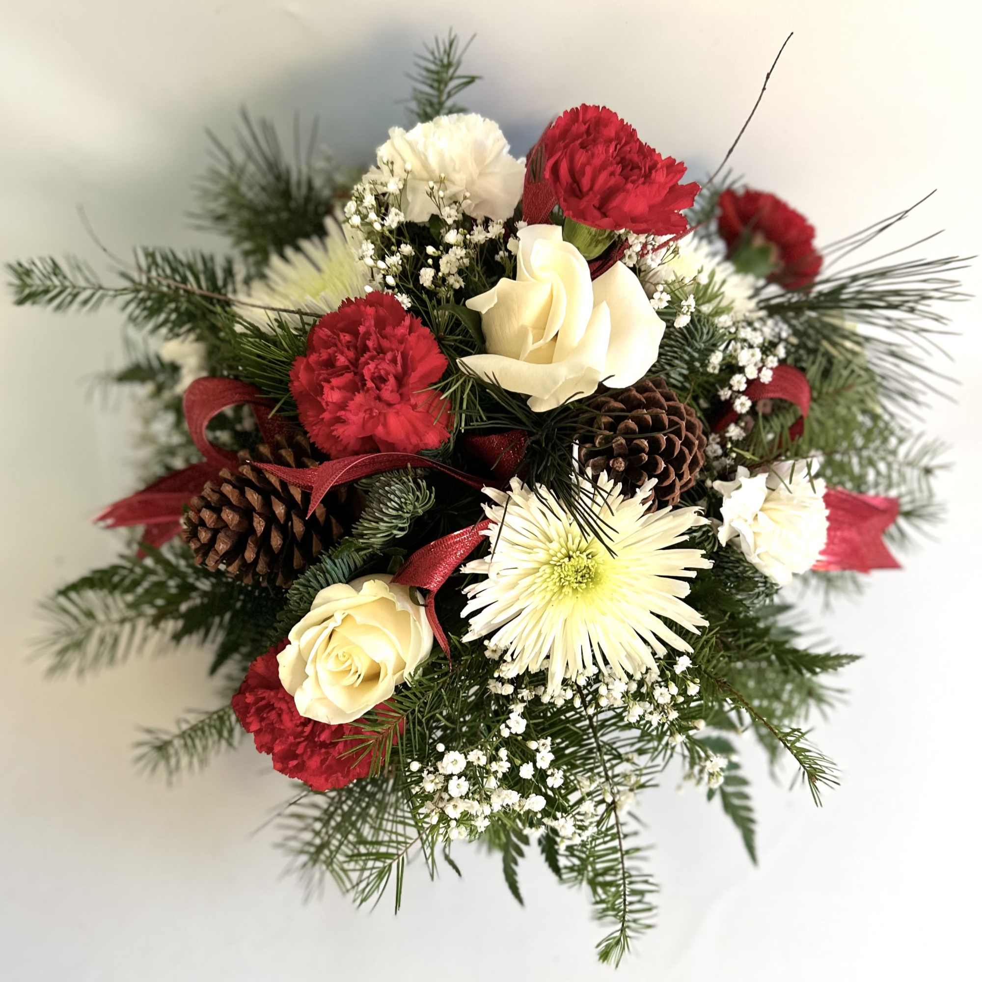 This simple and earthy centerpiece is created in a cement compote filled