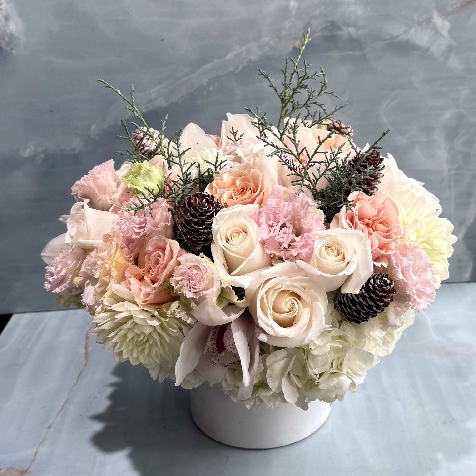 This very soft, romantic, and luxurious arrangement is designed in a low
