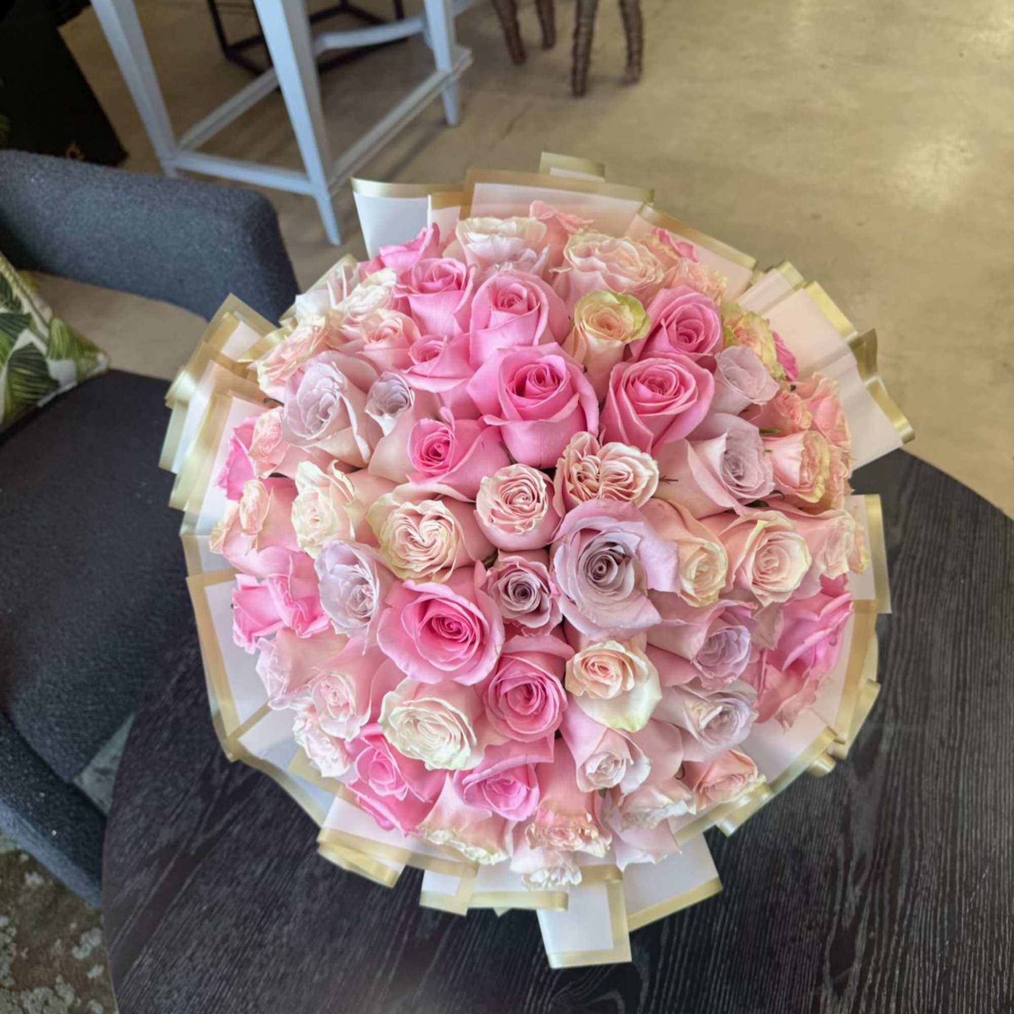 A soft mix of pink Roses, wrapped in a hand-tied bouquet with