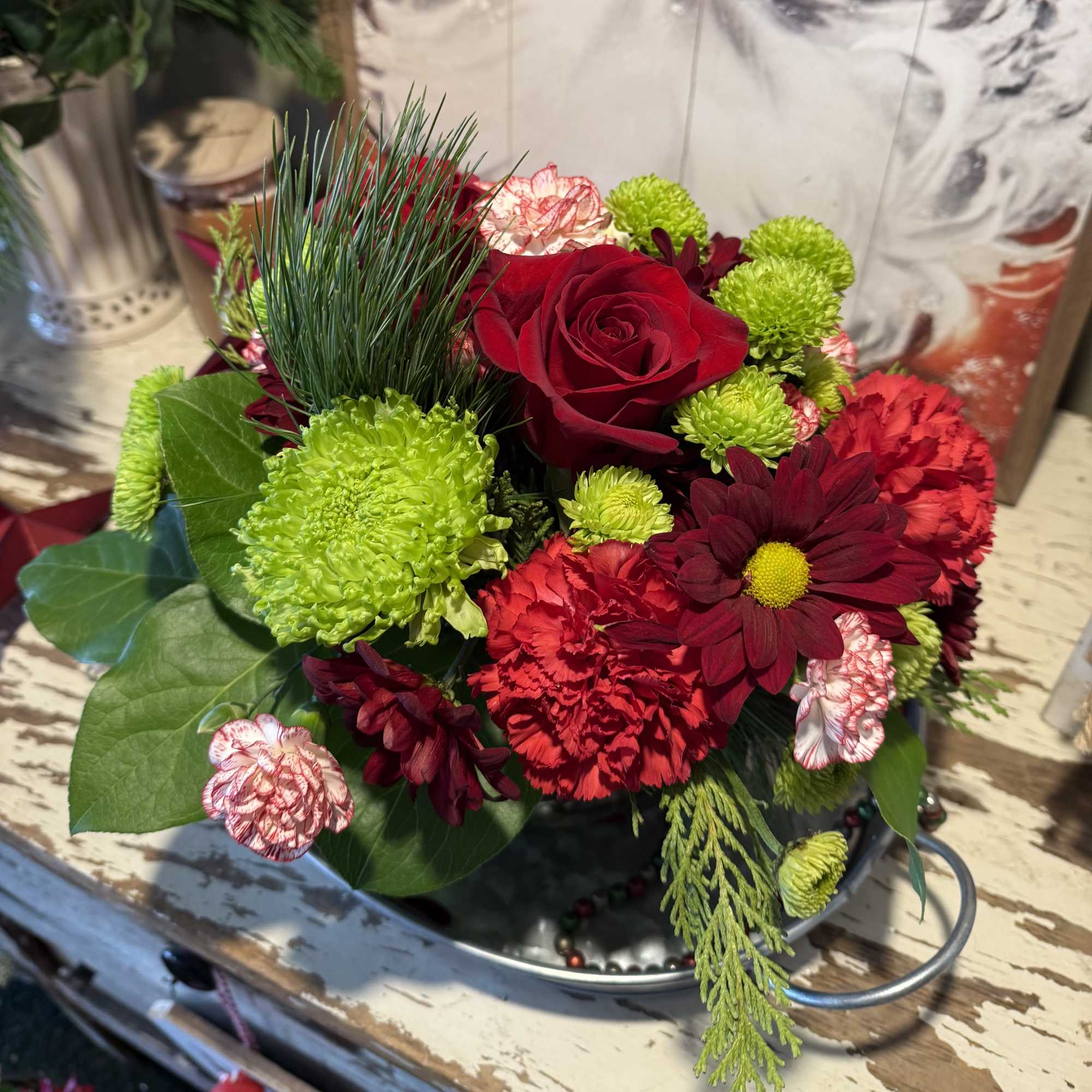 Beautiful variety of festive seasonal fresh red, white &amp; green flowers with