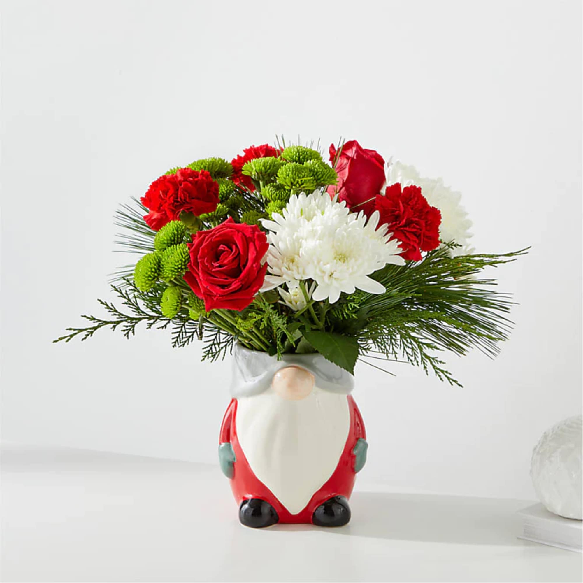 Gnomes are jollier than ever this holiday season. This novelty ceramic vase