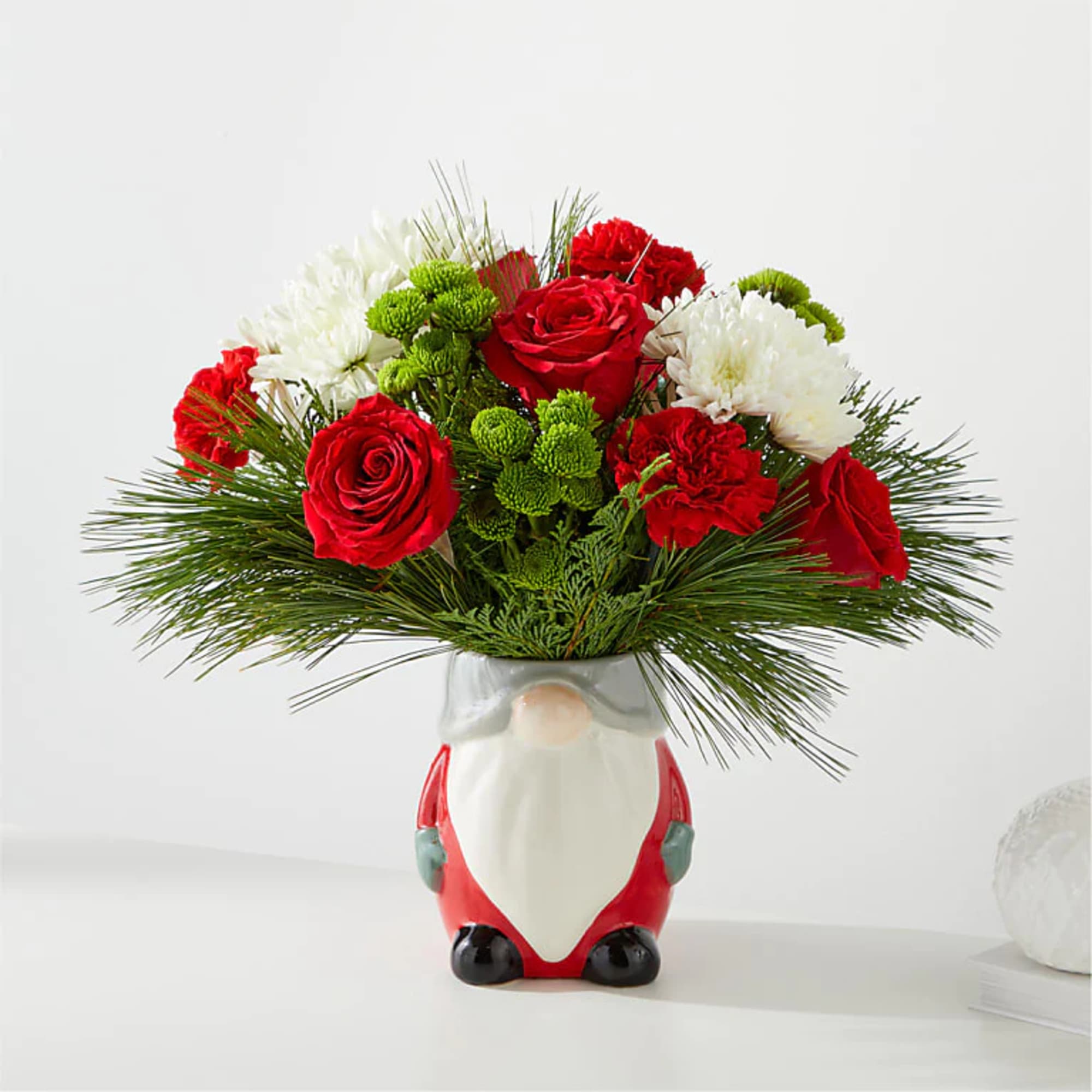 Gnomes are jollier than ever this holiday season. This novelty ceramic vase