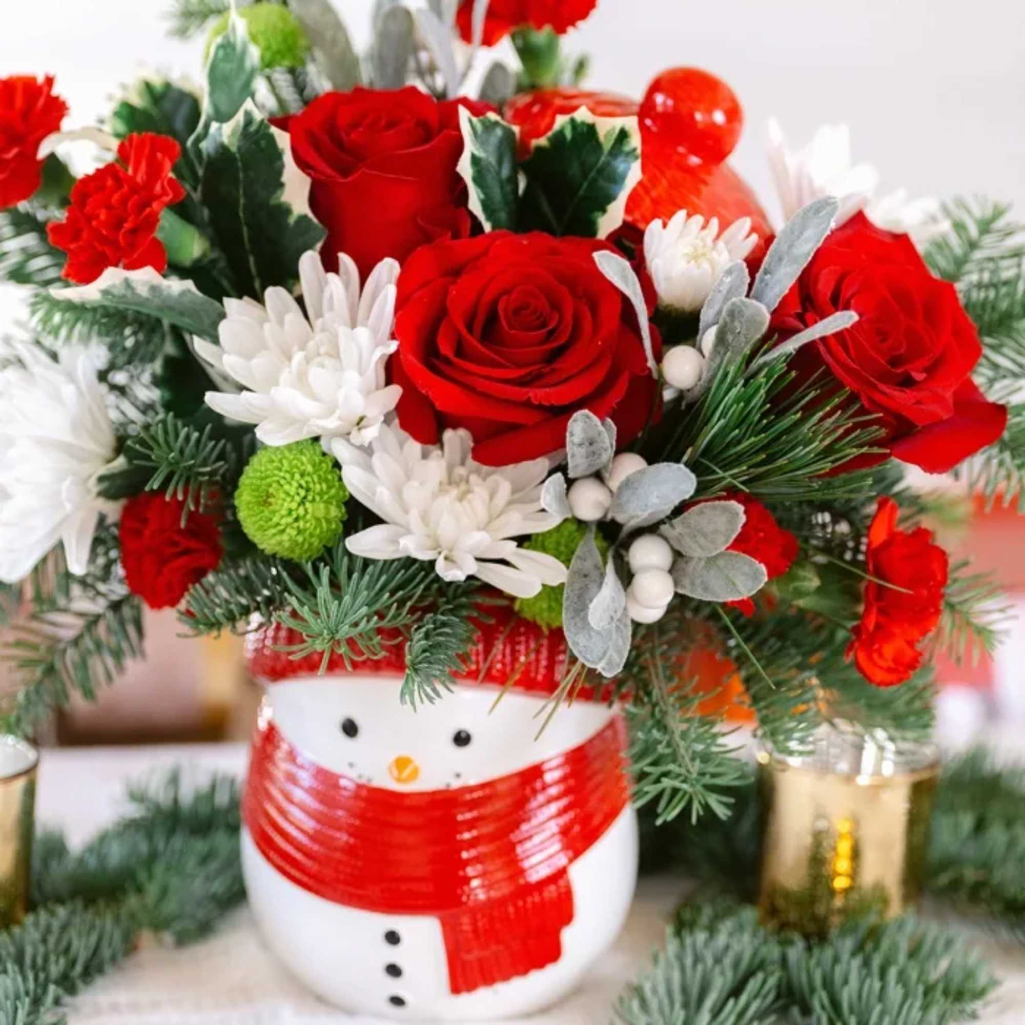 Whether it's filled with festive Christmas flowers or sweet treats, this cheerful