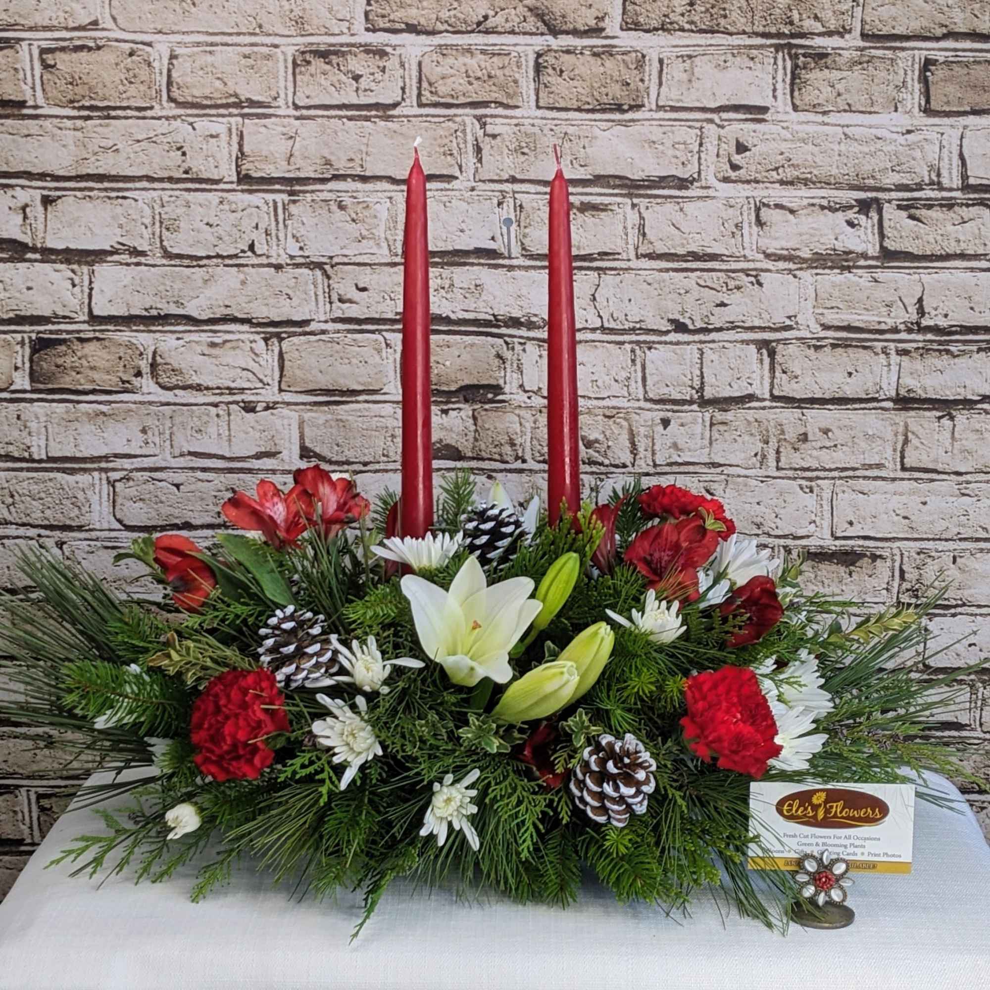 Double the Cheer is a classic holiday centerpiece with a bold, cozy