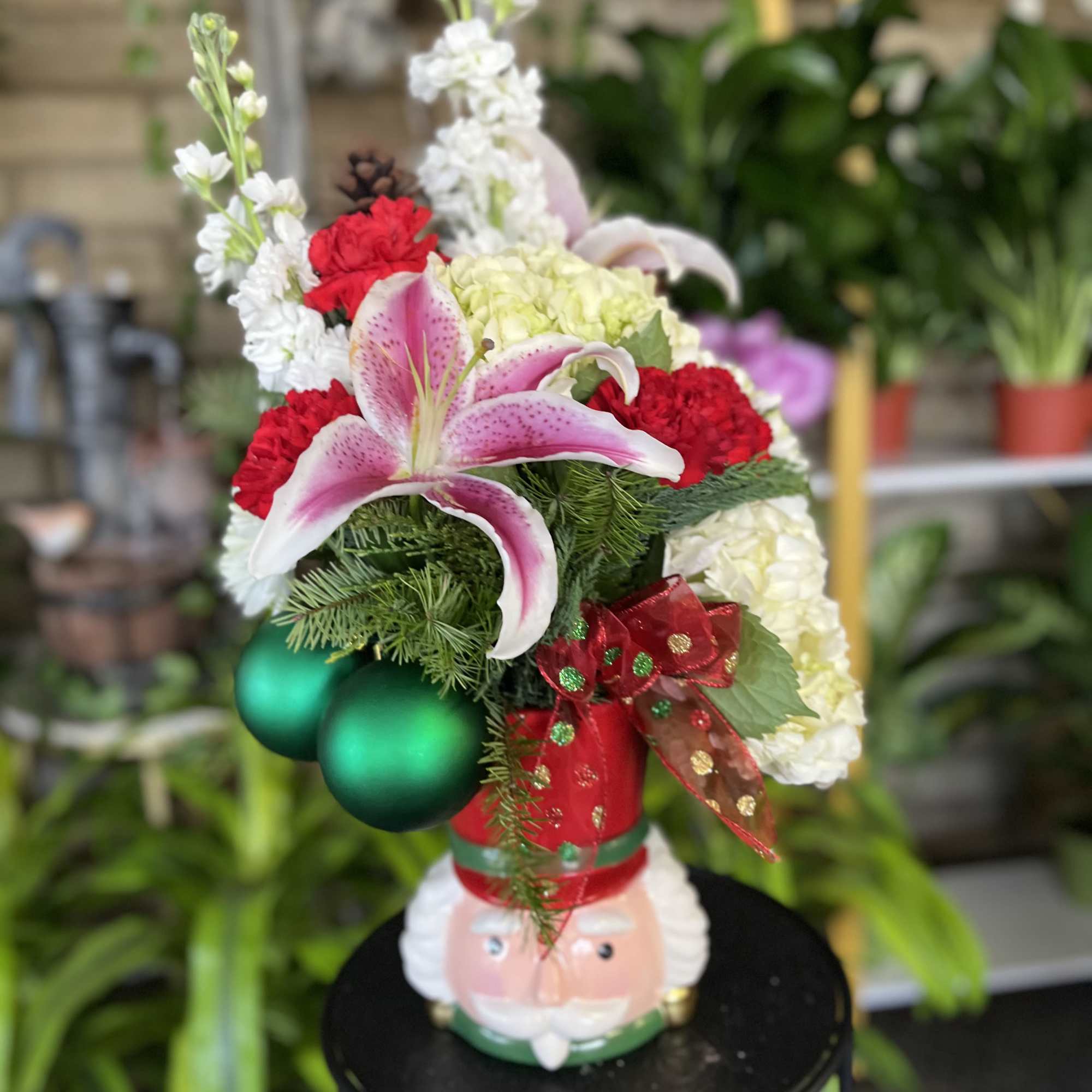 Fresh  flowers in Nut Cracker vase 