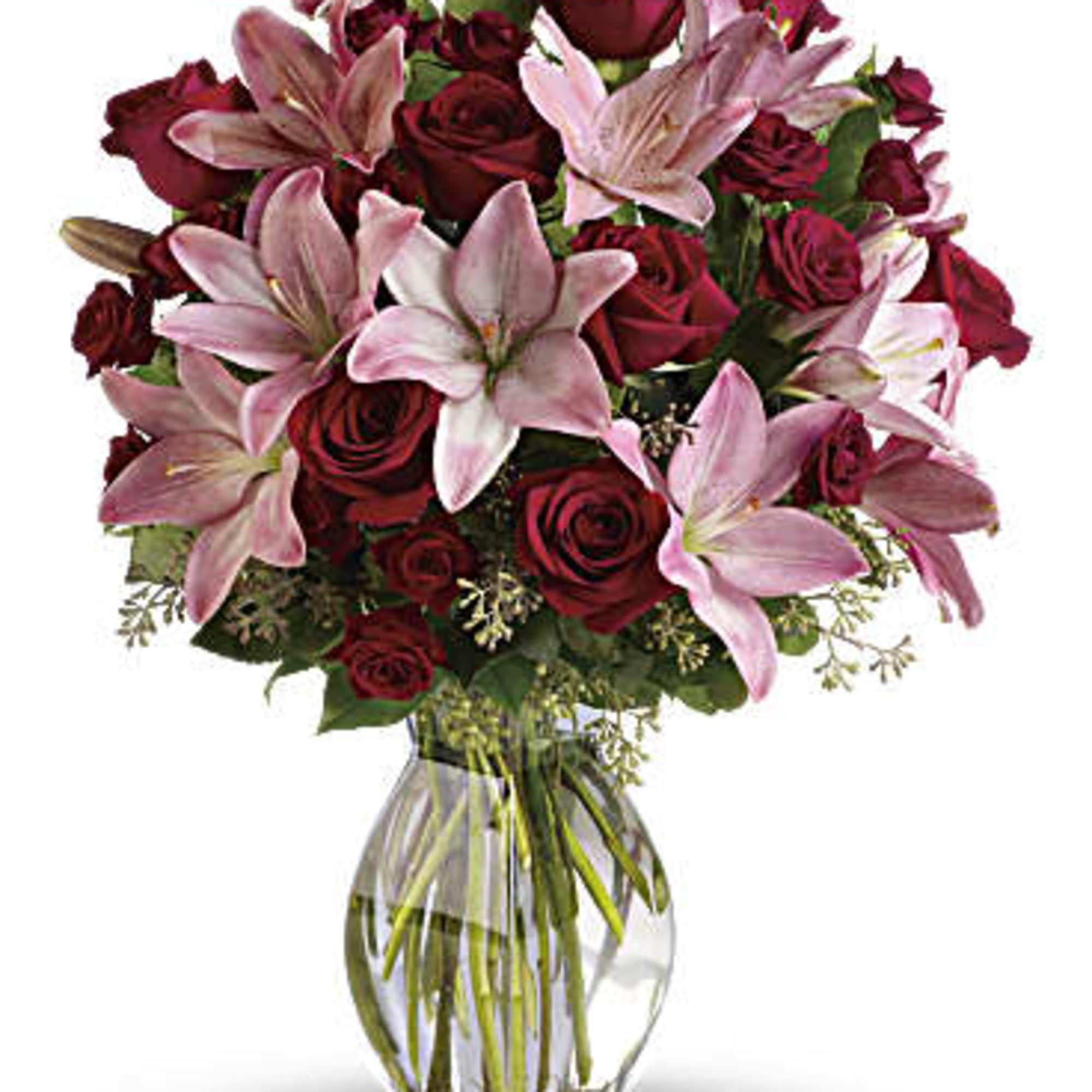 Lovely reds and pinks come together in this lavishly romantic anniversary gift.