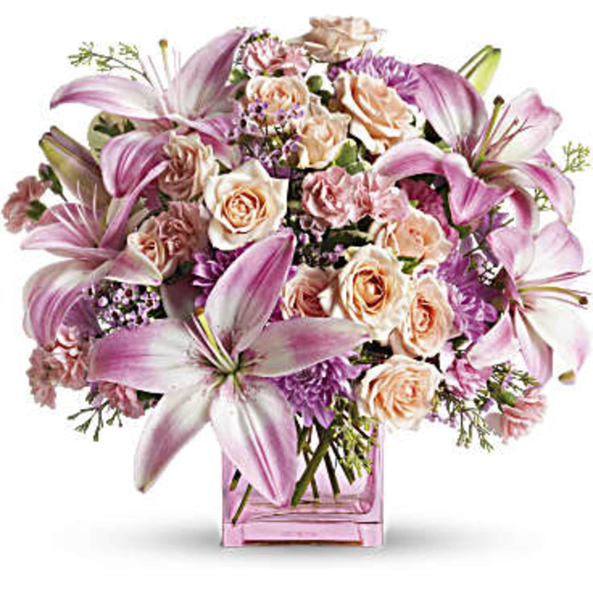 Impossibly pretty. This decidedly feminine arrangement is absolutely delightful. Perfectly peachy peach