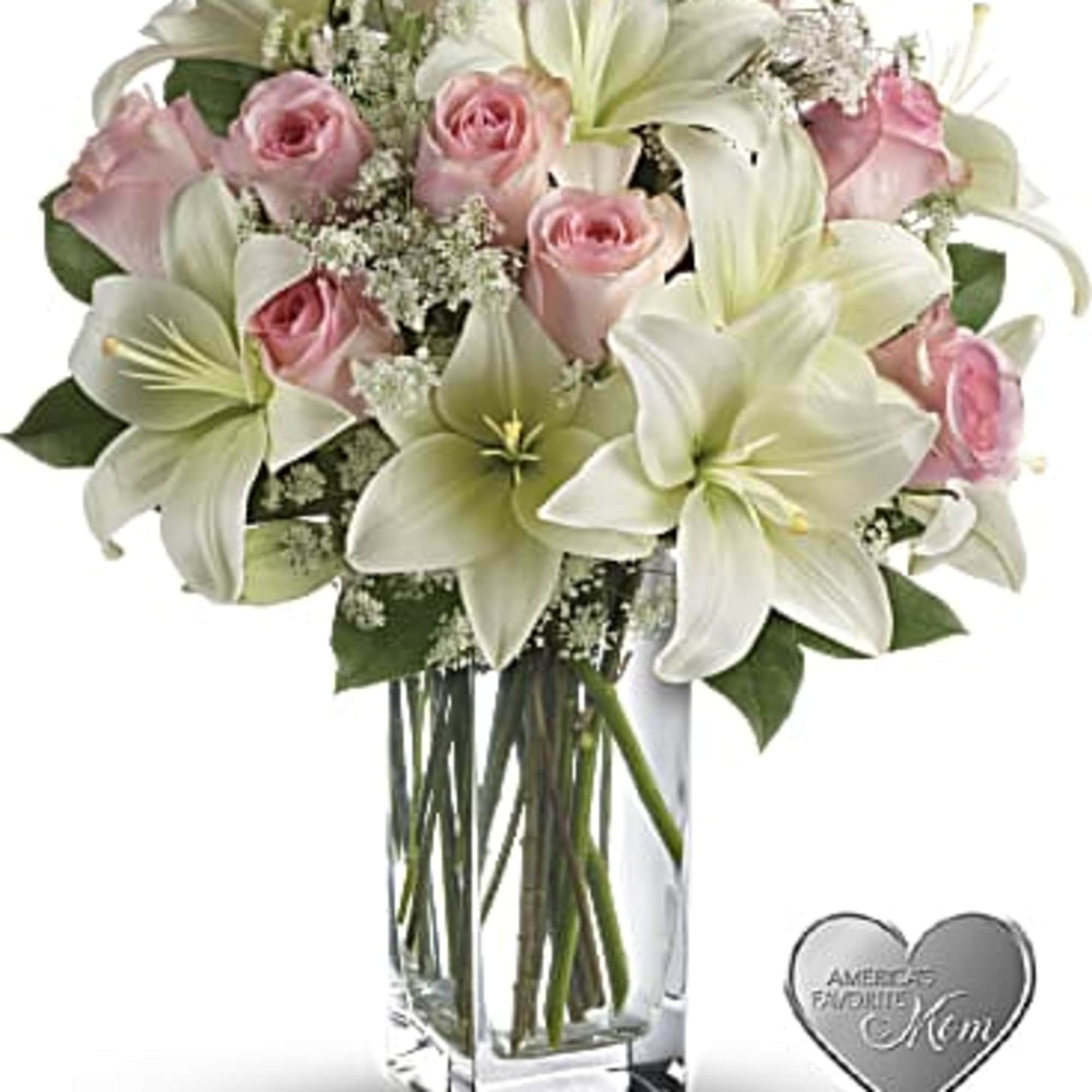 Stunning in its simplicity, this innocent harmony of light pink roses and