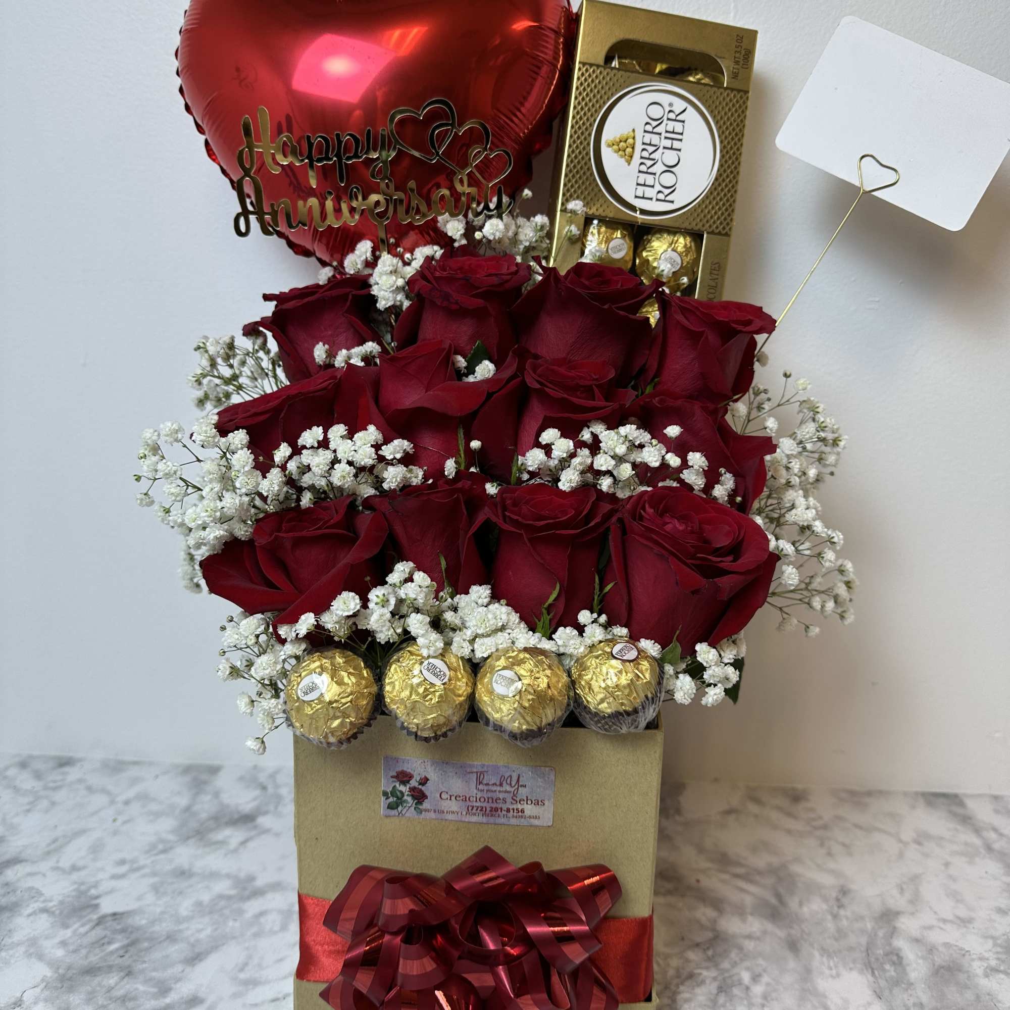 Box with 12 roses, box with 8 Ferrero chocolates and a heart-shaped