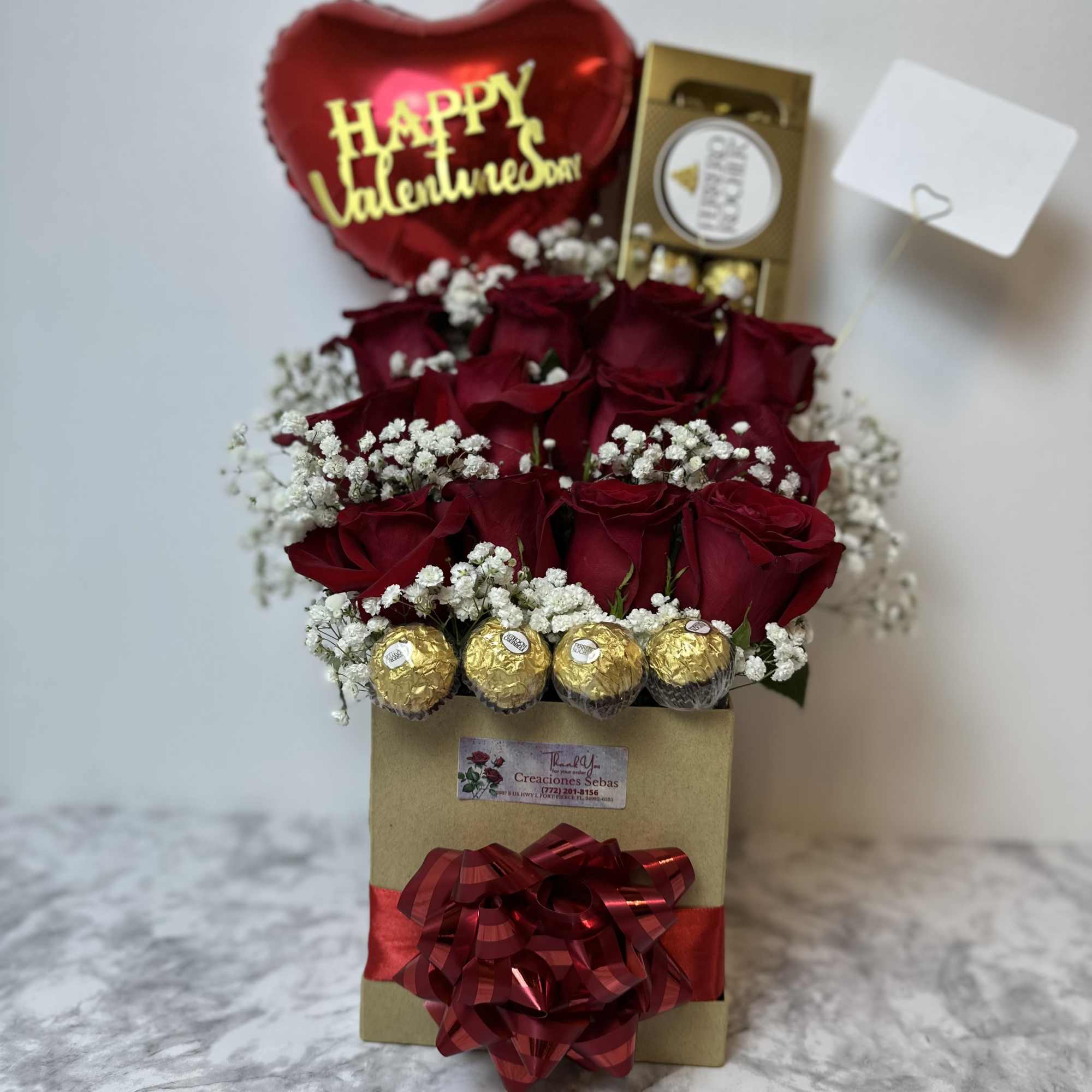 Box with 12 roses, box with 8 Ferrero chocolates and a heart-shaped