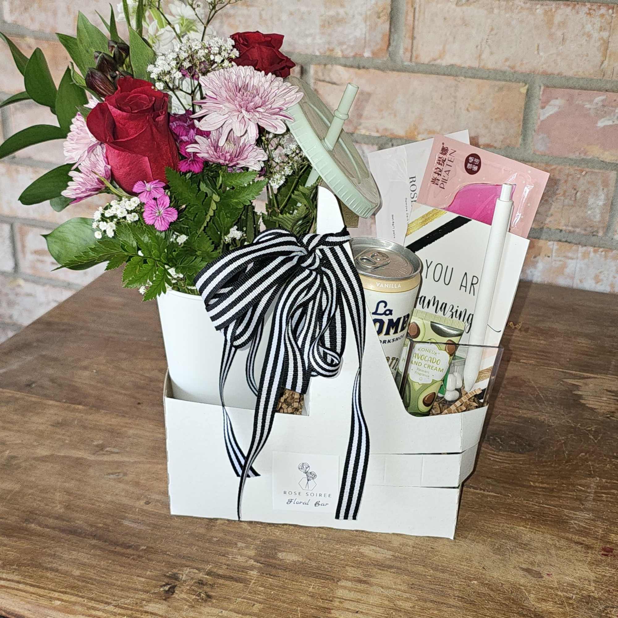 A cheerful mix of fresh florals, a light sip, and feel-good treats