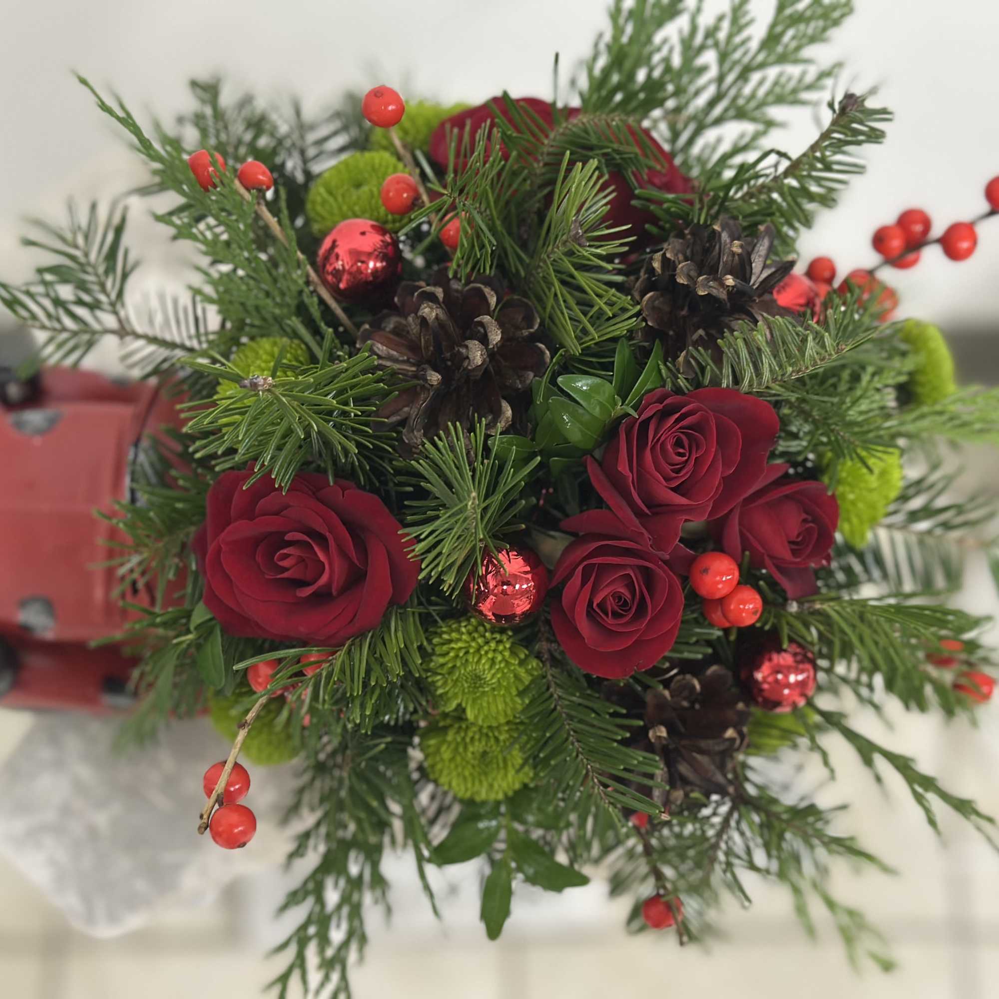 Transform your holiday decor with the Merry and Bright Truck Arrangement by