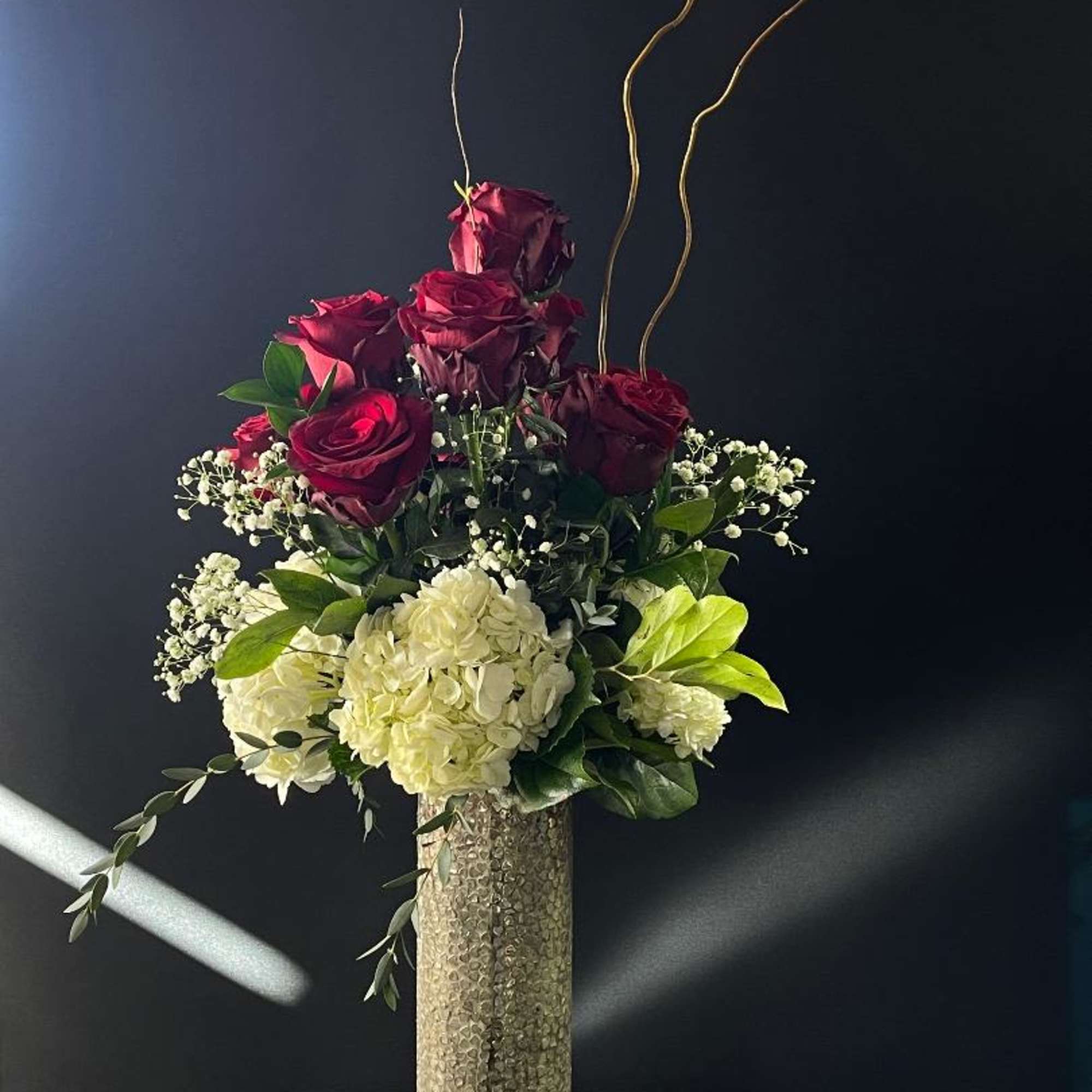 Beautiful and Elegant yet perfect for the occasion.  This tall vase