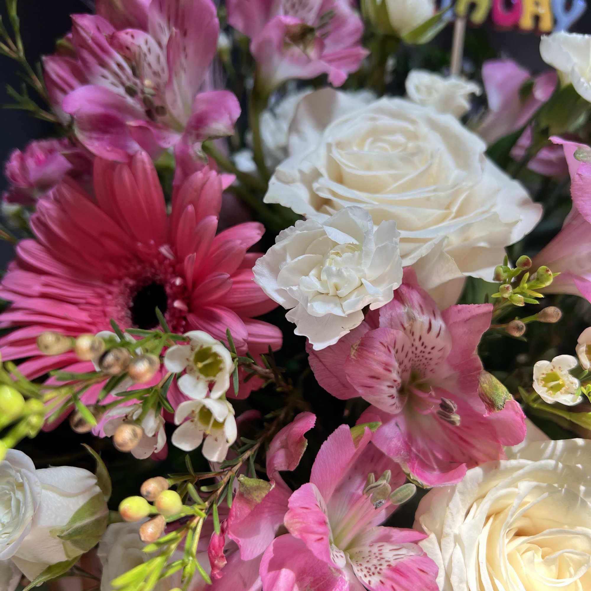 Celebrate in full colour with this joyful floral arrangement, designed to brighten