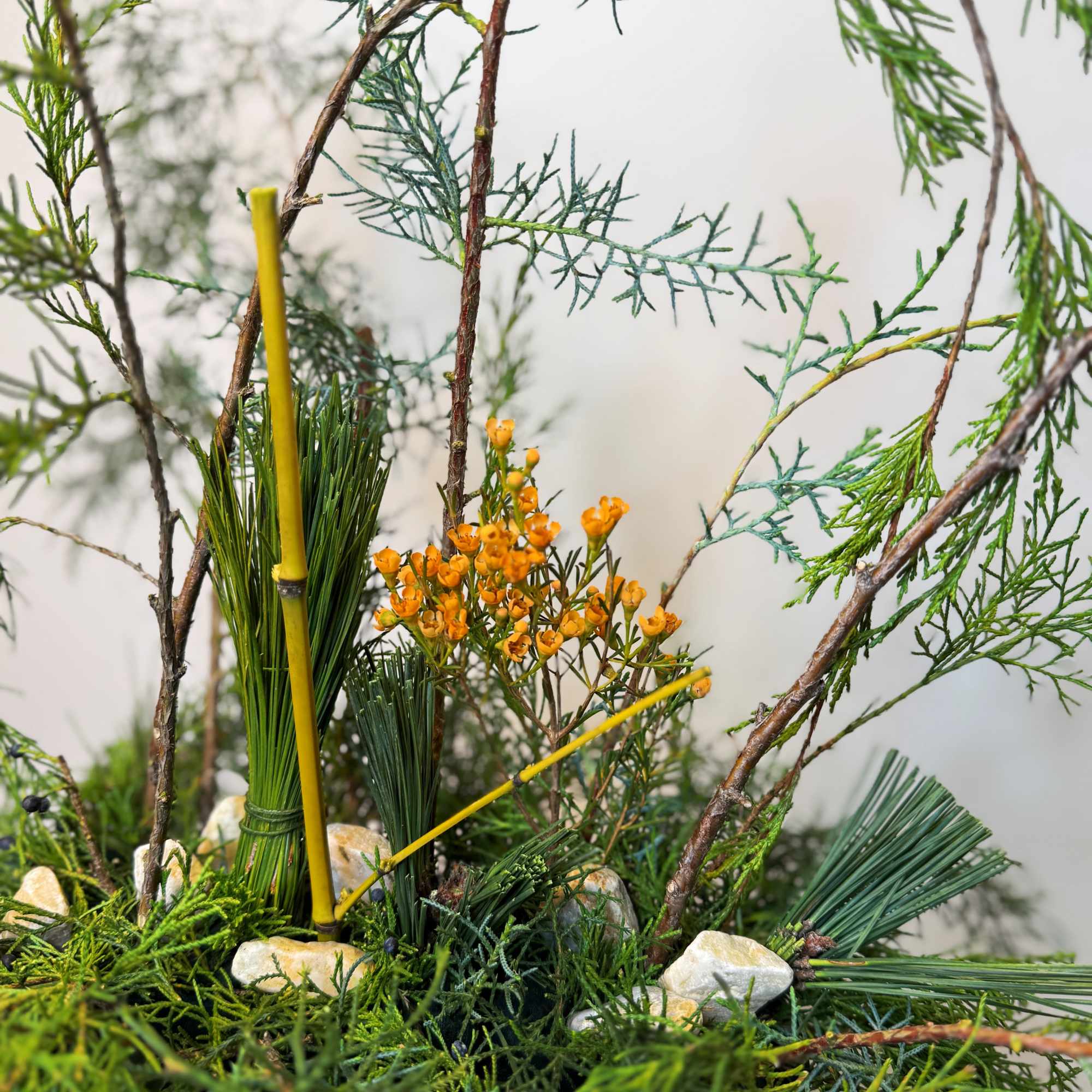 A sculptural botanical composition created from carefully selected foliage and natural lines