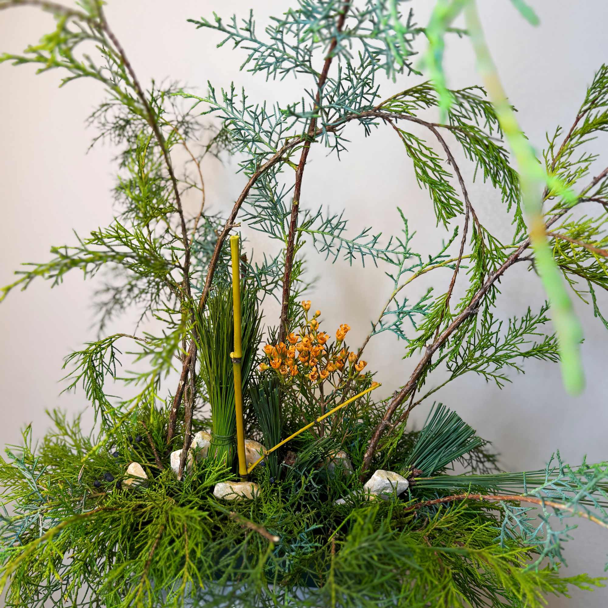 A sculptural botanical composition created from carefully selected foliage and natural lines