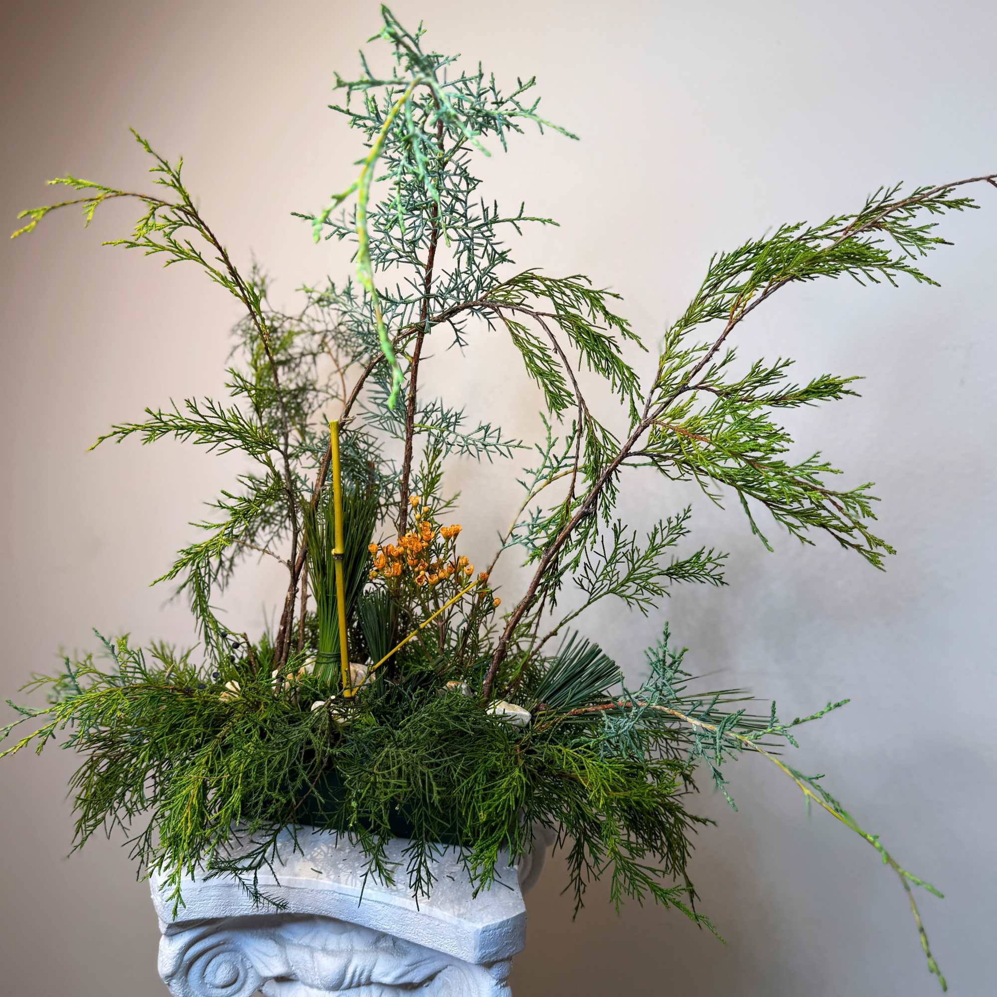 A sculptural botanical composition created from carefully selected foliage and natural lines