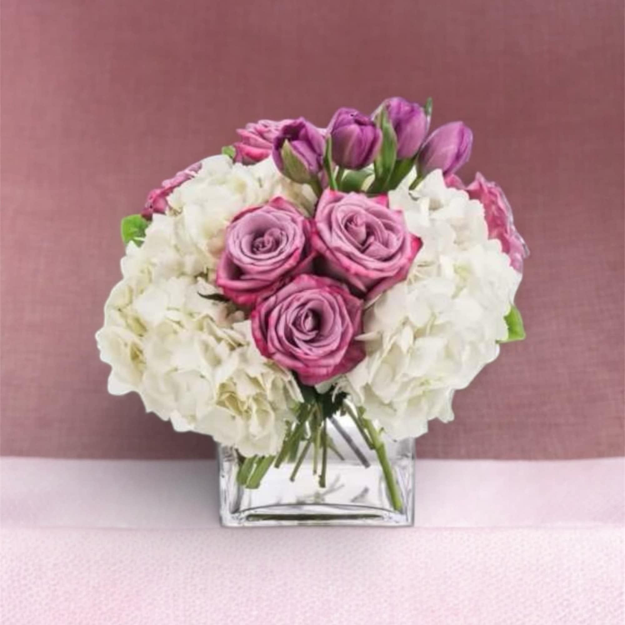 Express your condolences after the loss of a loved one with flowers.