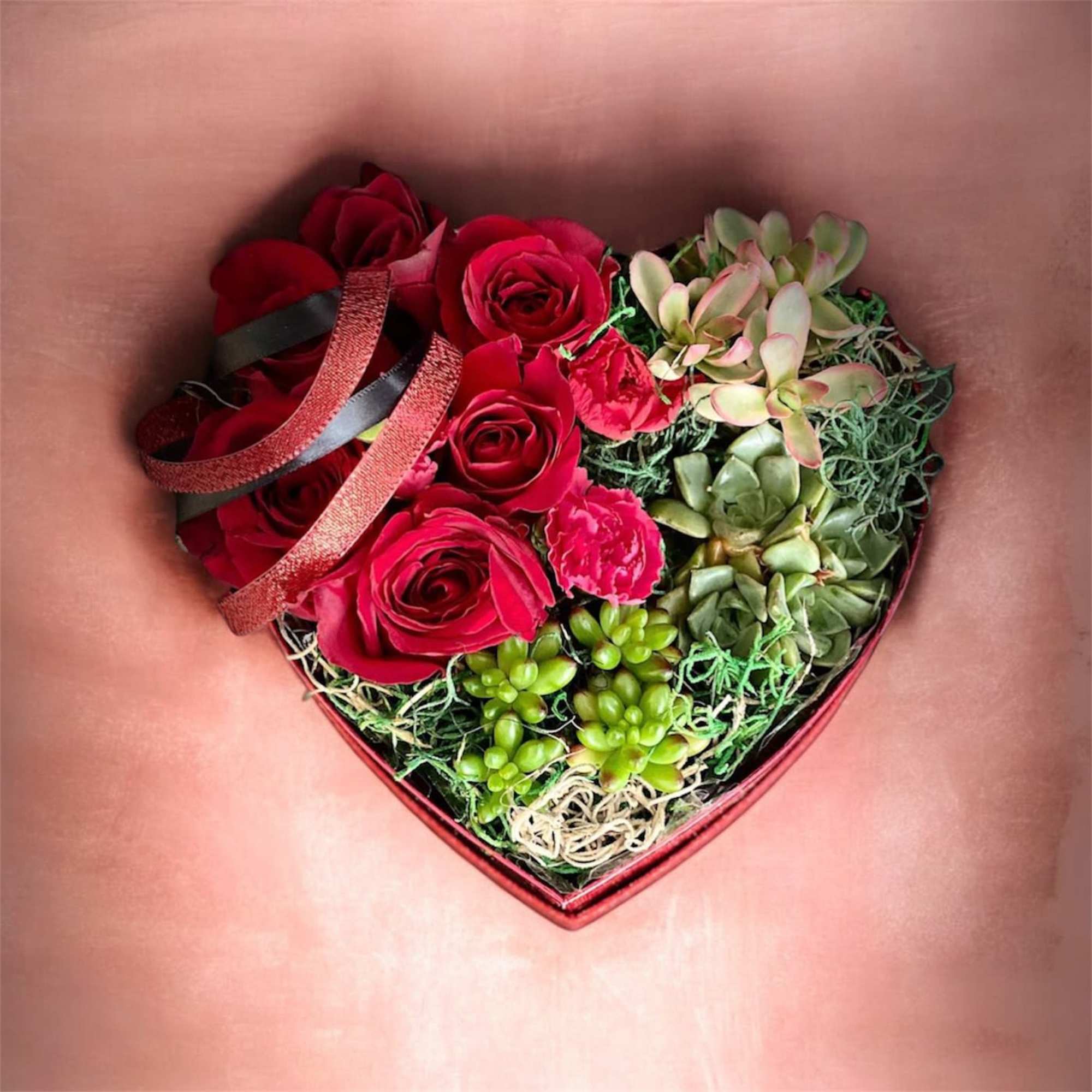 Elevate romance with our Heart-Shaped Box featuring a perfect union of velvety